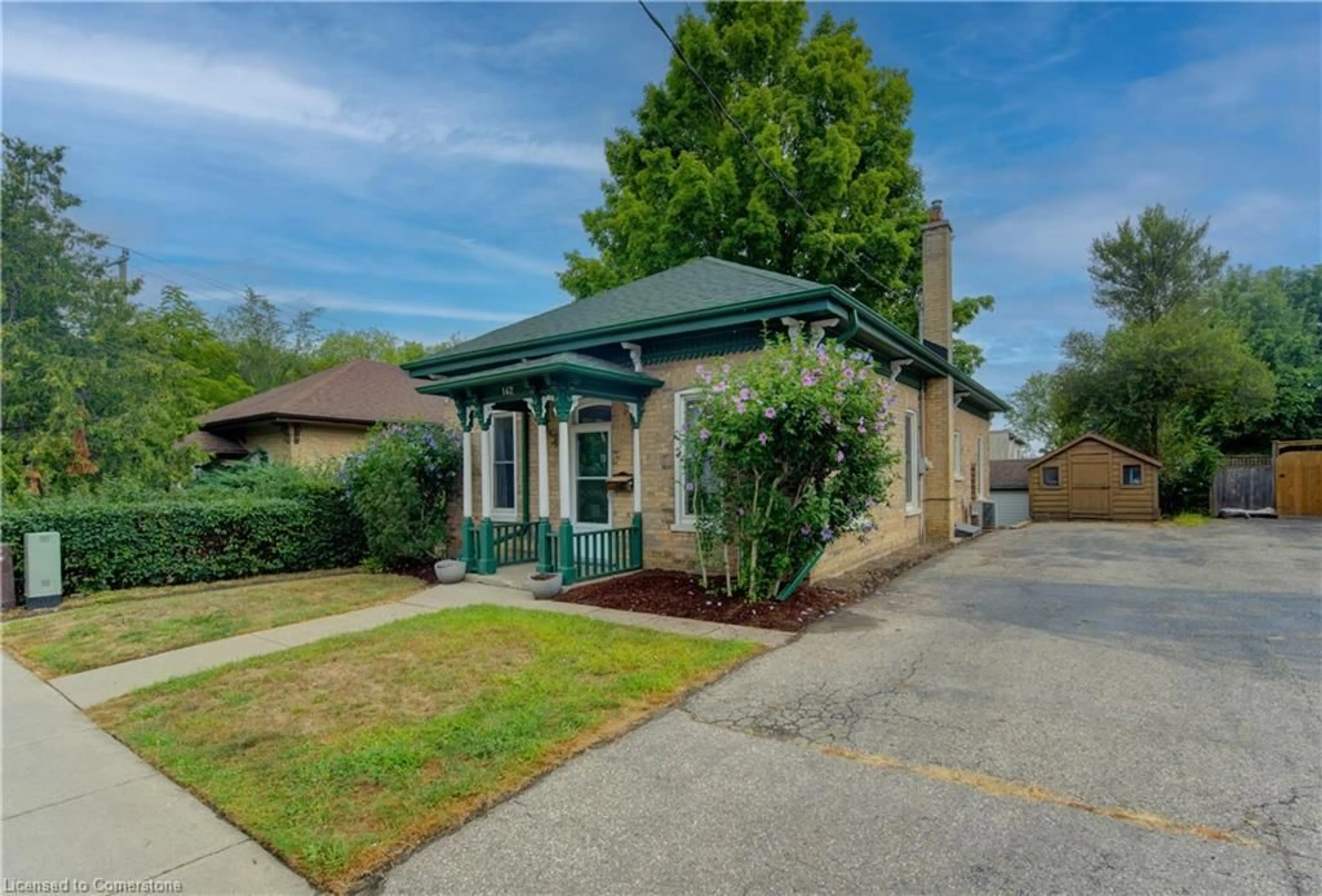 Home with brick exterior material, street for 142 Church St, Kitchener Ontario N2G 2S6