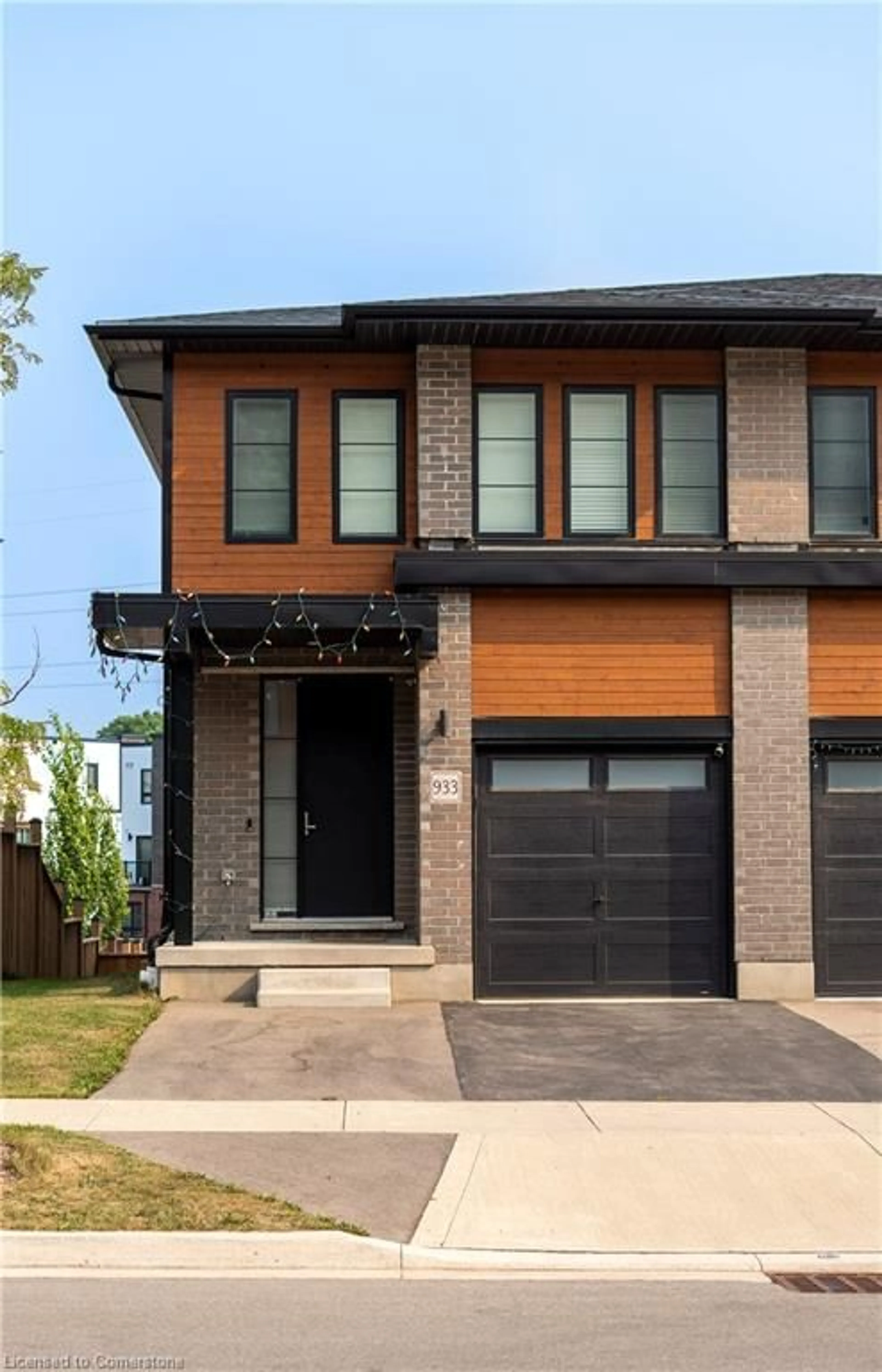 Home with brick exterior material, street for 933 Robert Ferrie Dr, Kitchener Ontario N2P 0P9