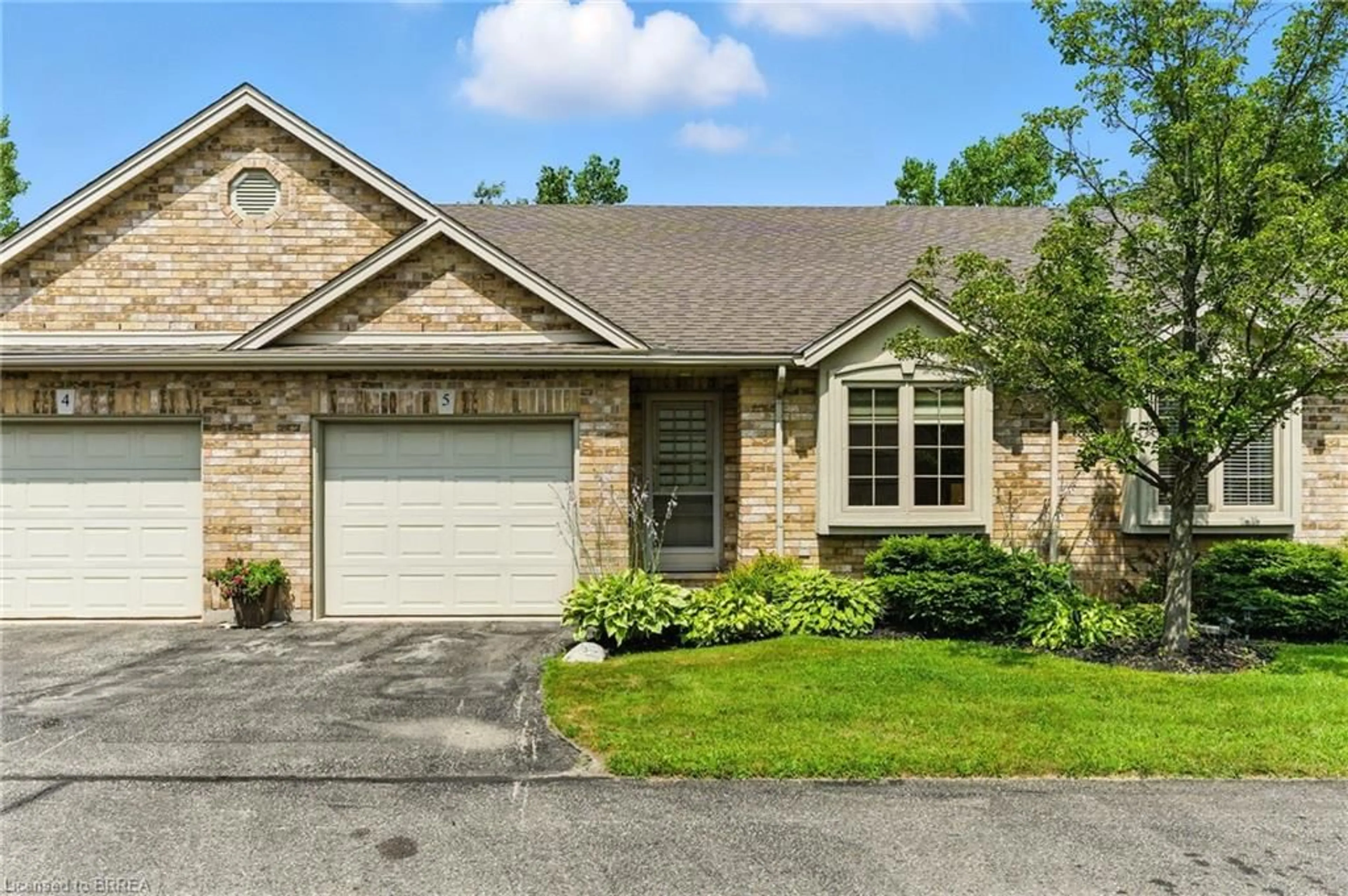 Home with brick exterior material, street for 633 Park Road North #5, Brantford Ontario N3R 8B6
