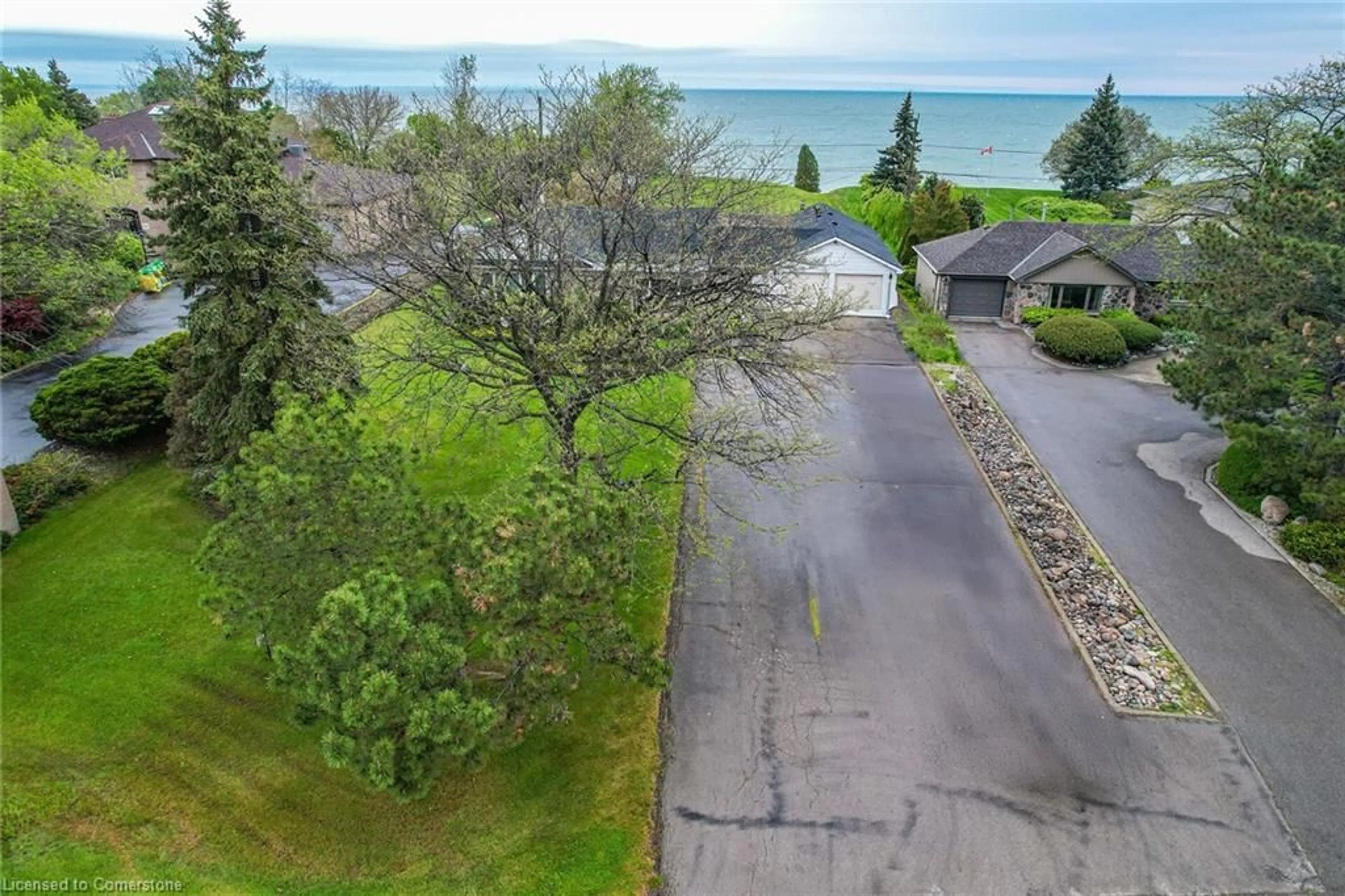 A pic from outside/outdoor area/front of a property/back of a property/a pic from drone, water/lake/river/ocean view for 1033 North Service Rd, Stoney Creek Ontario L8E 5C8