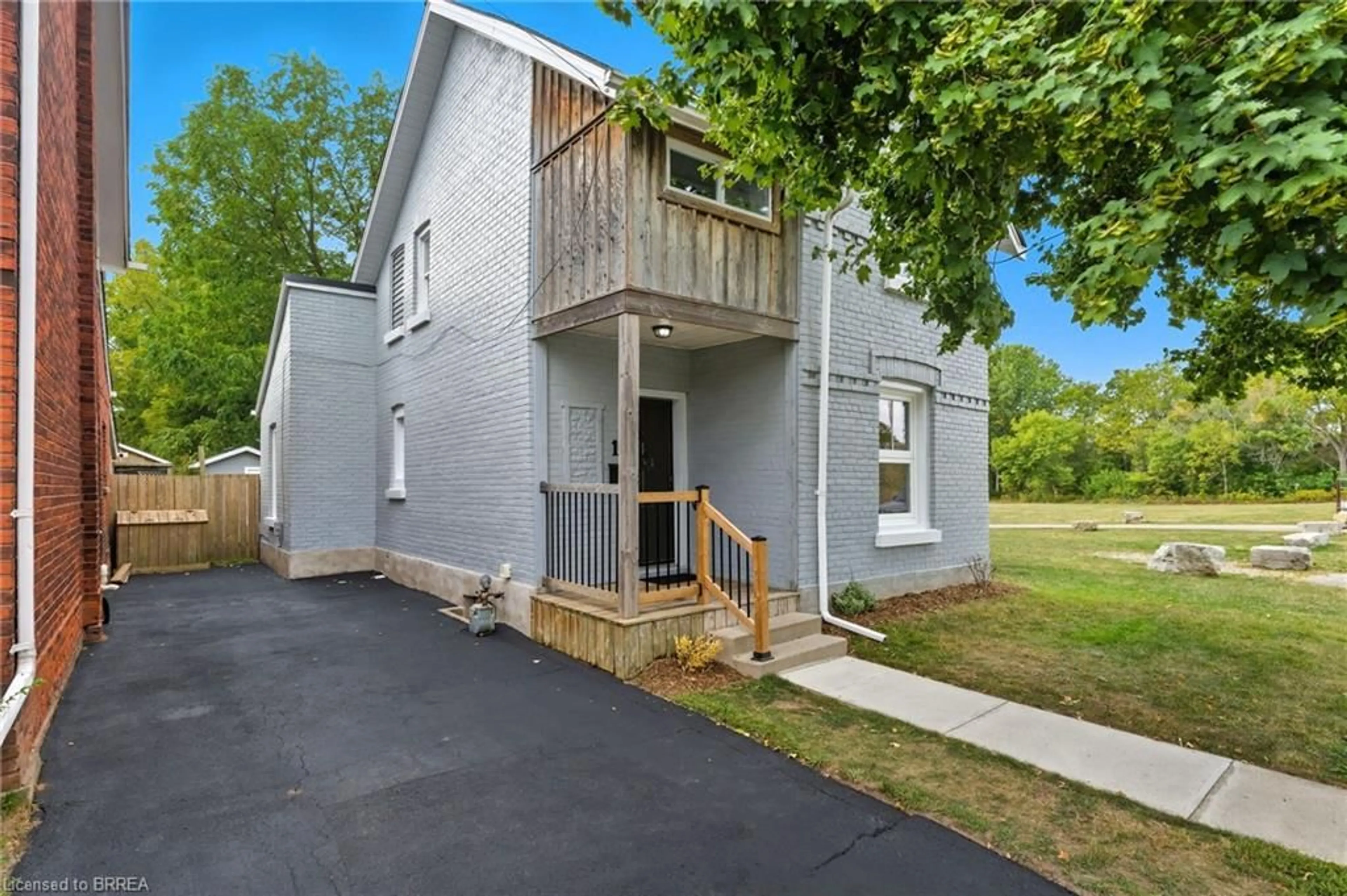 Home with vinyl exterior material, street for 1 Ontario St, Brantford Ontario N3S 2B7