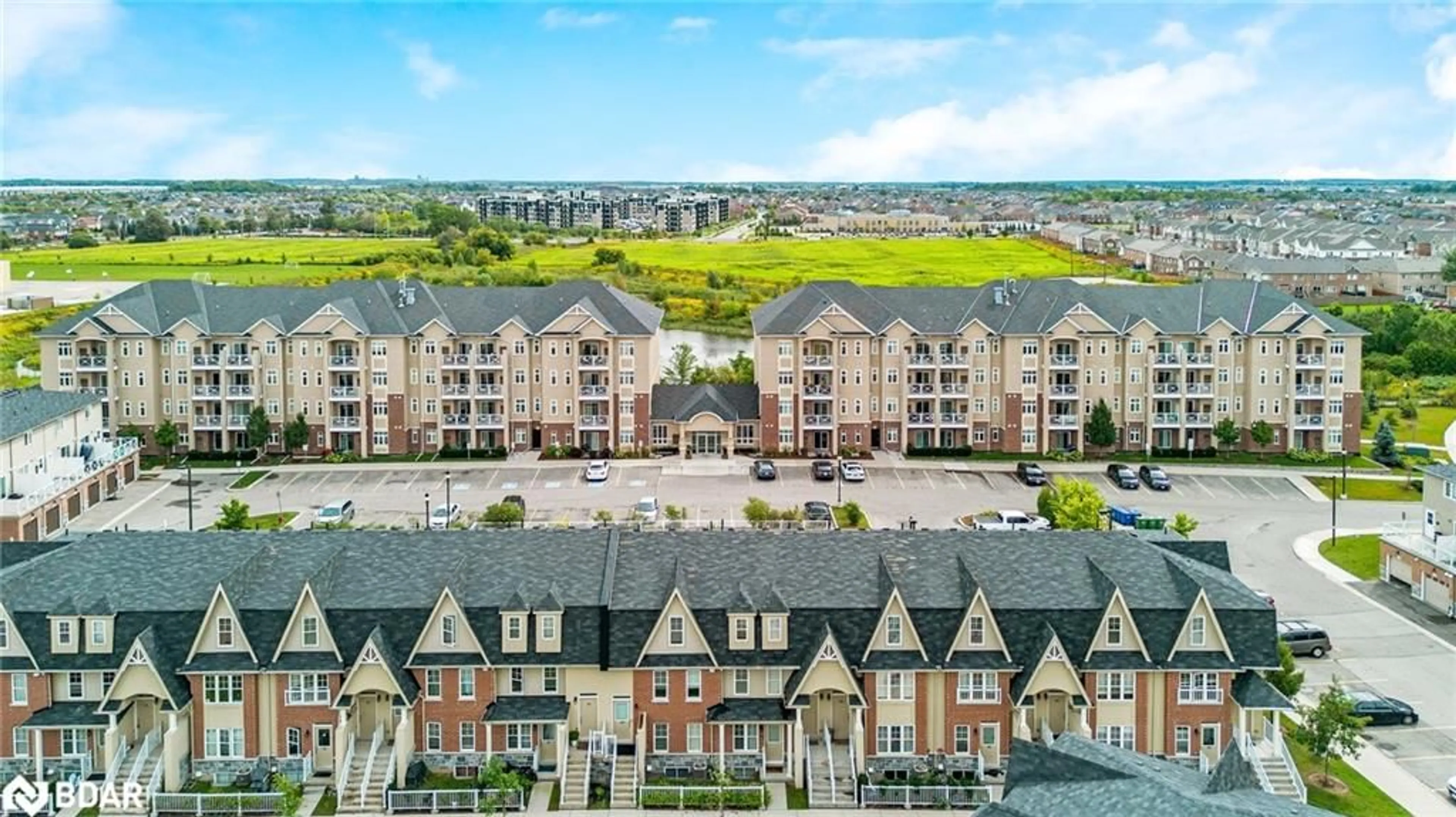 A pic from outside/outdoor area/front of a property/back of a property/a pic from drone, city buildings view from balcony for 1370 Costigan Rd #304, Milton Ontario L9T 0Y8