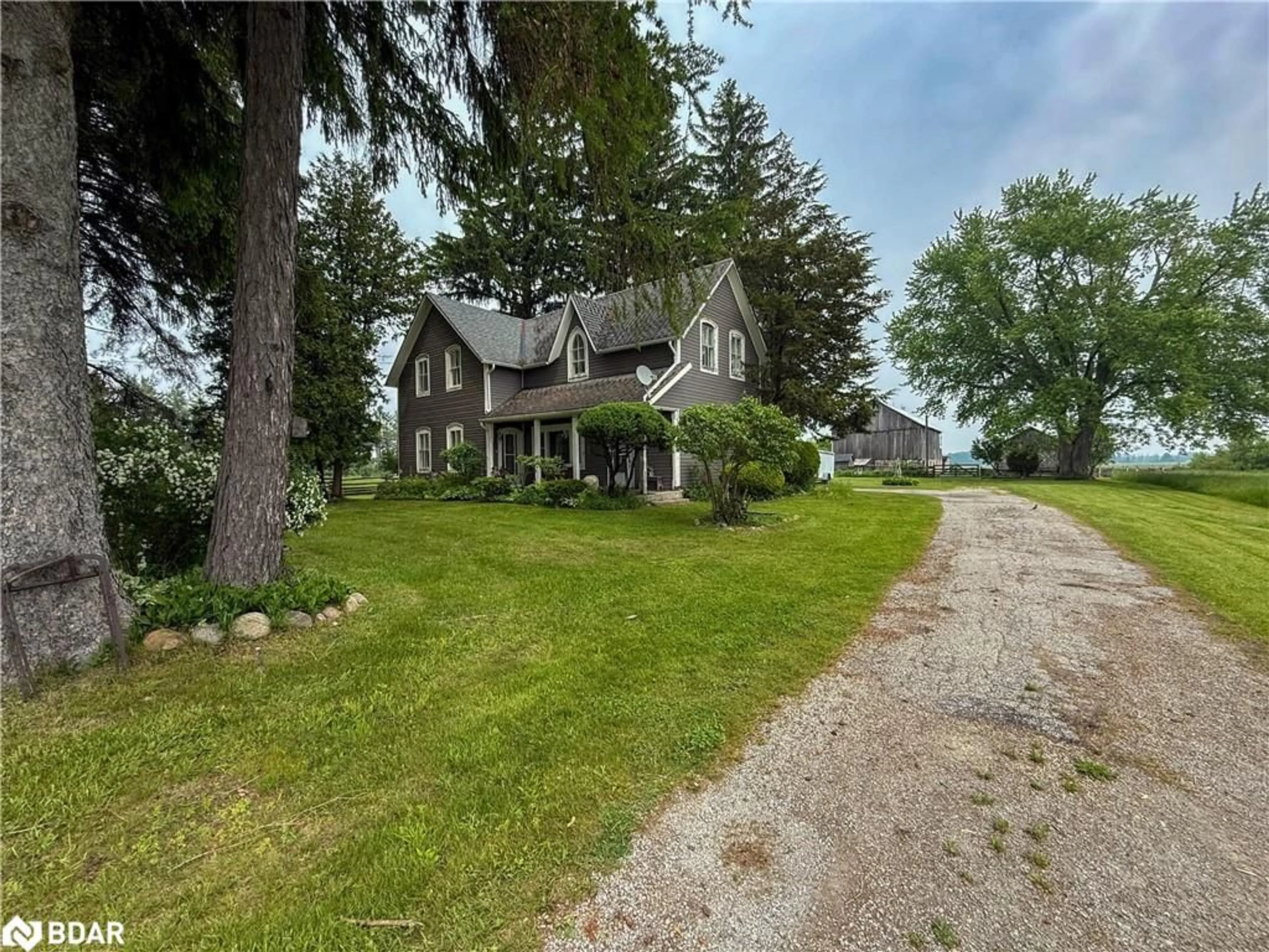 A pic from outside/outdoor area/front of a property/back of a property/a pic from drone, street for 10187 County Rd 10 Rd, New Lowell Ontario L0M 1N0