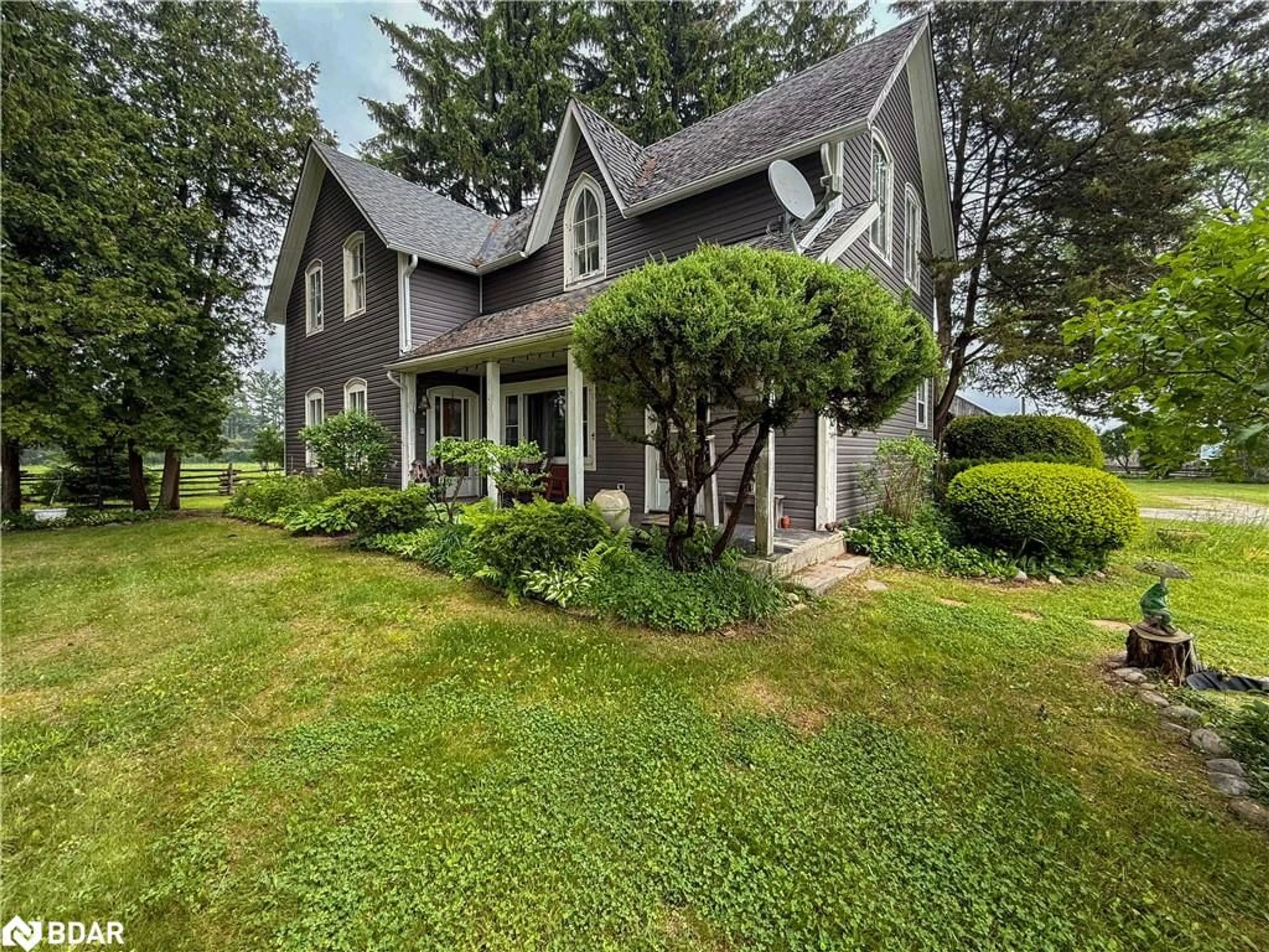 A pic from outside/outdoor area/front of a property/back of a property/a pic from drone, street for 10187 County Rd 10 Rd, New Lowell Ontario L0M 1N0