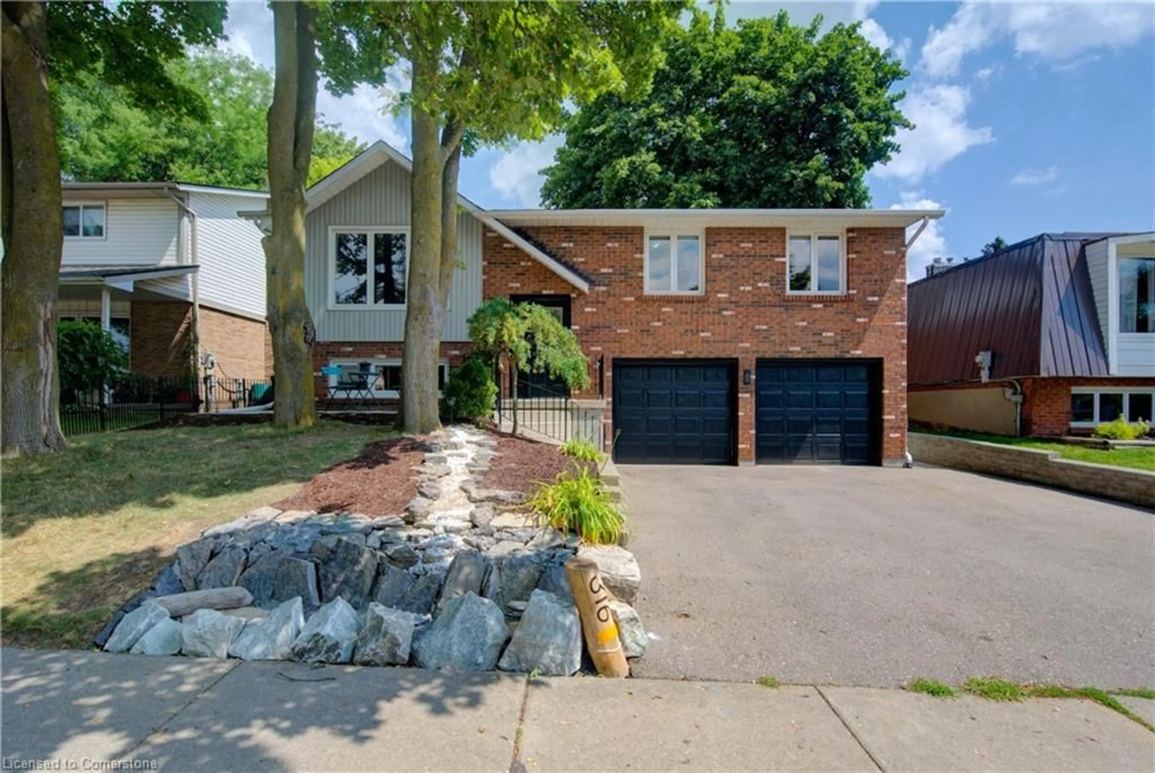 Home with brick exterior material, street for 316 Country Hill Dr, Kitchener Ontario N2E 2C2