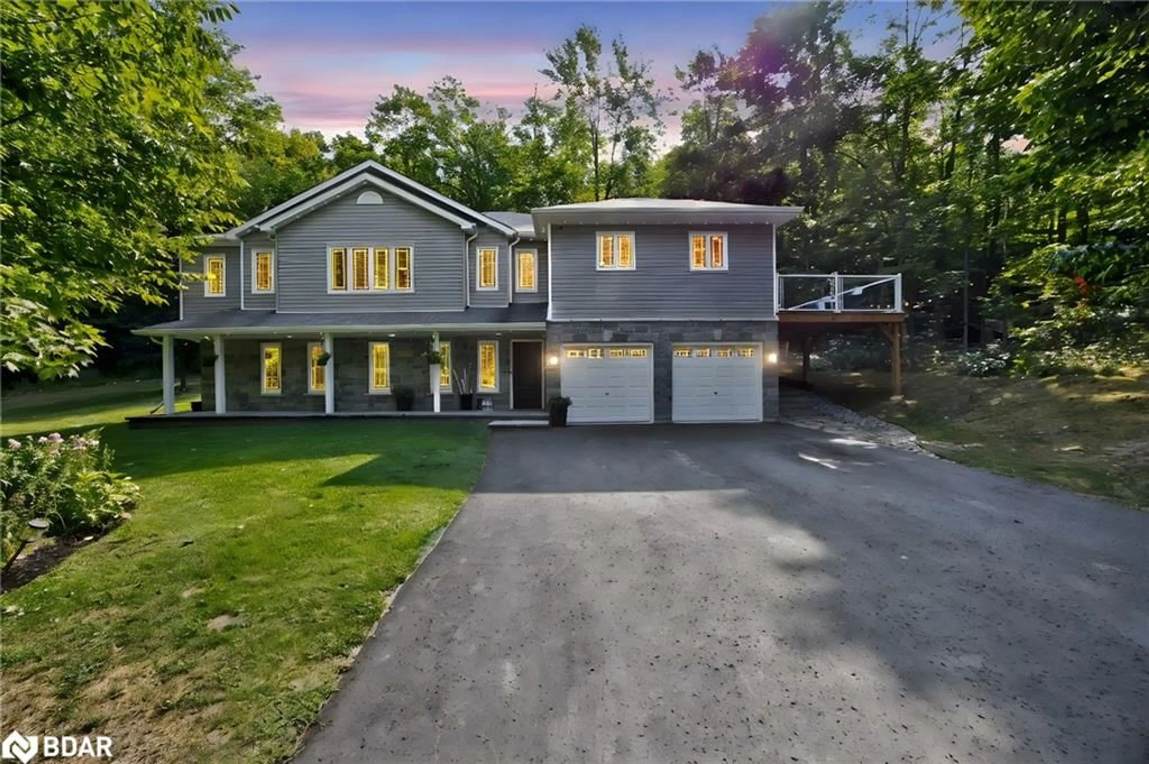 A pic from outside/outdoor area/front of a property/back of a property/a pic from drone, street for 135 Huron Woods Drive, Coldwater Ontario L0K 1E0