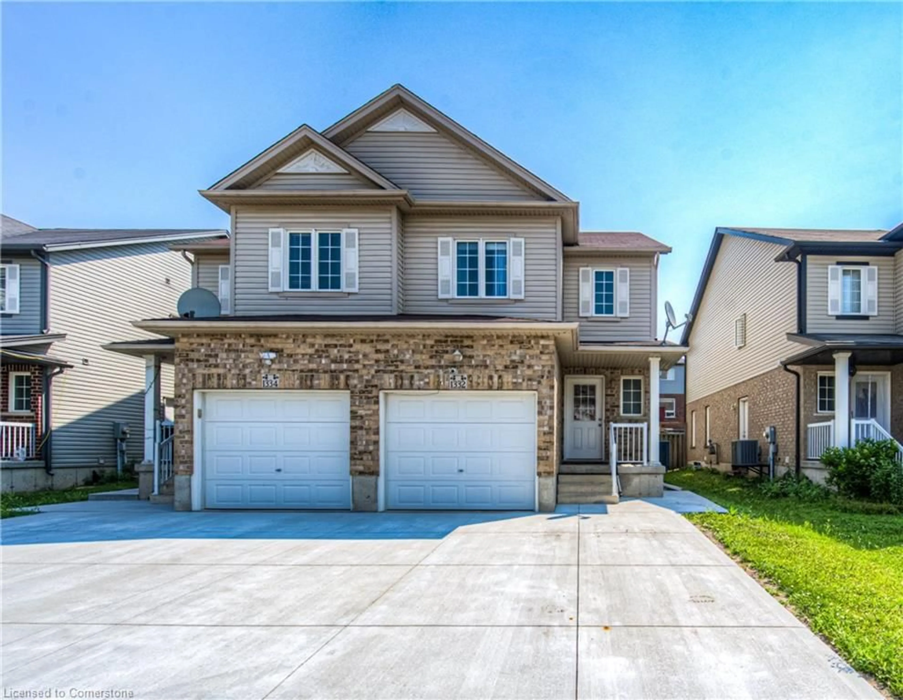 Home with brick exterior material, street for 1332 Countrystone Dr, Kitchener Ontario N2N 3R9