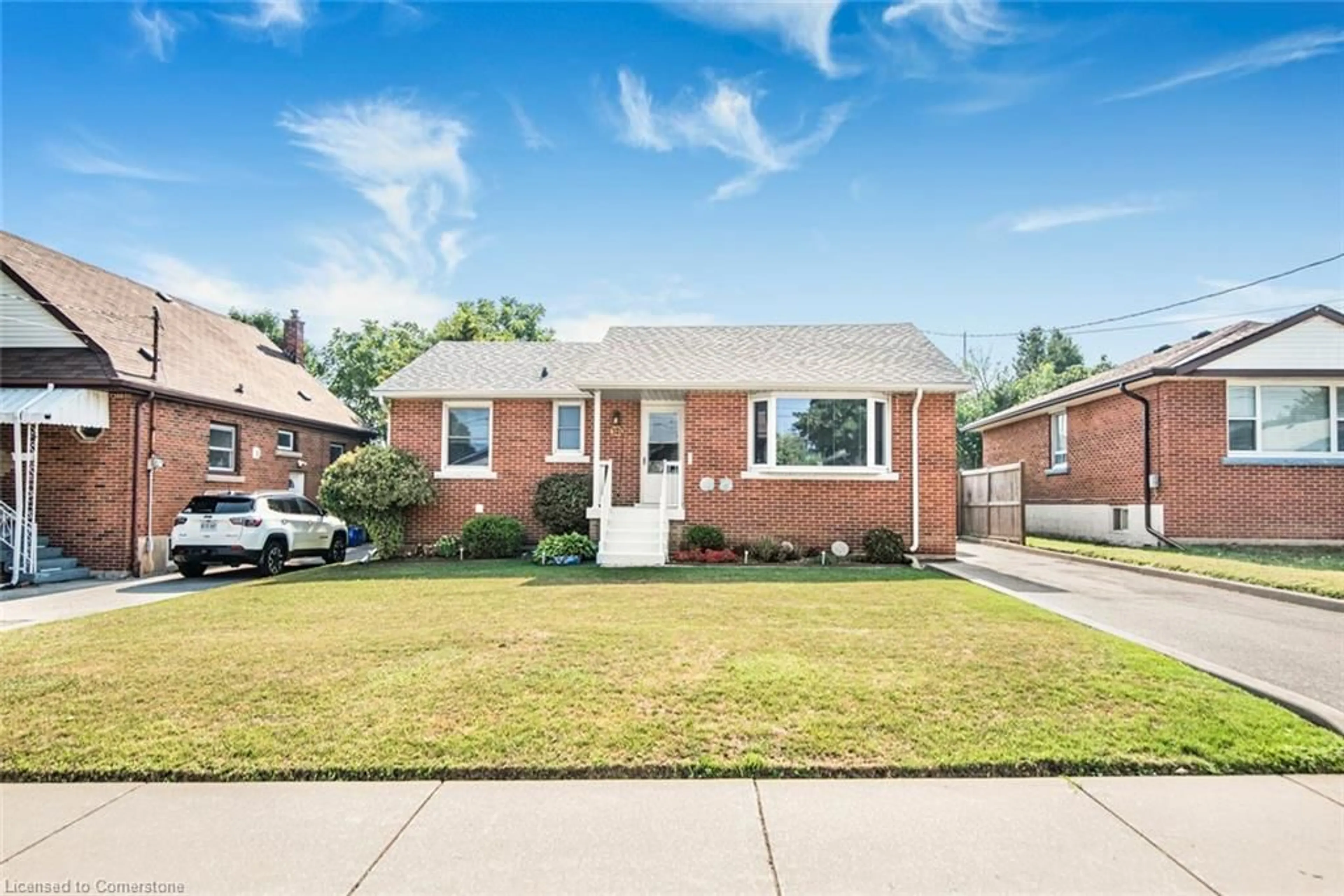 Home with brick exterior material, street for 321 East 15th St, Hamilton Ontario L9A 4G6