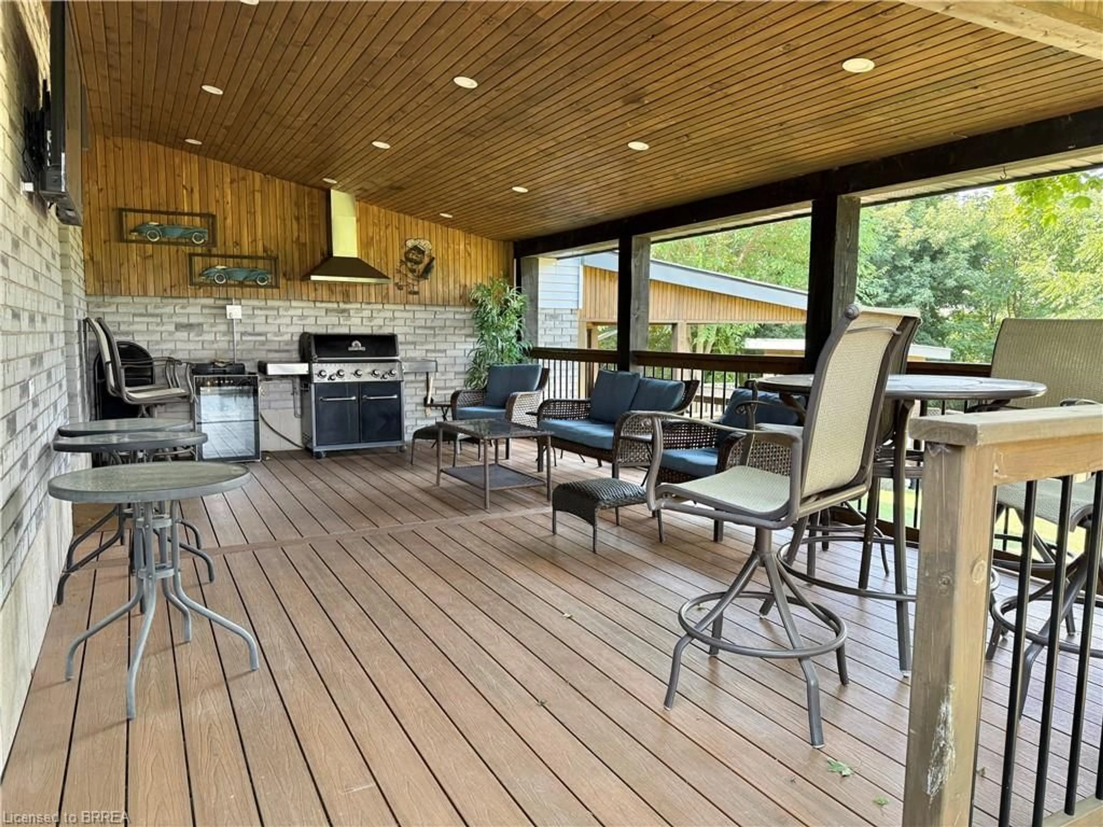 Open concept kitchen, wood/laminate floor for 49 Scott St, St. George Ontario N0E 1N0