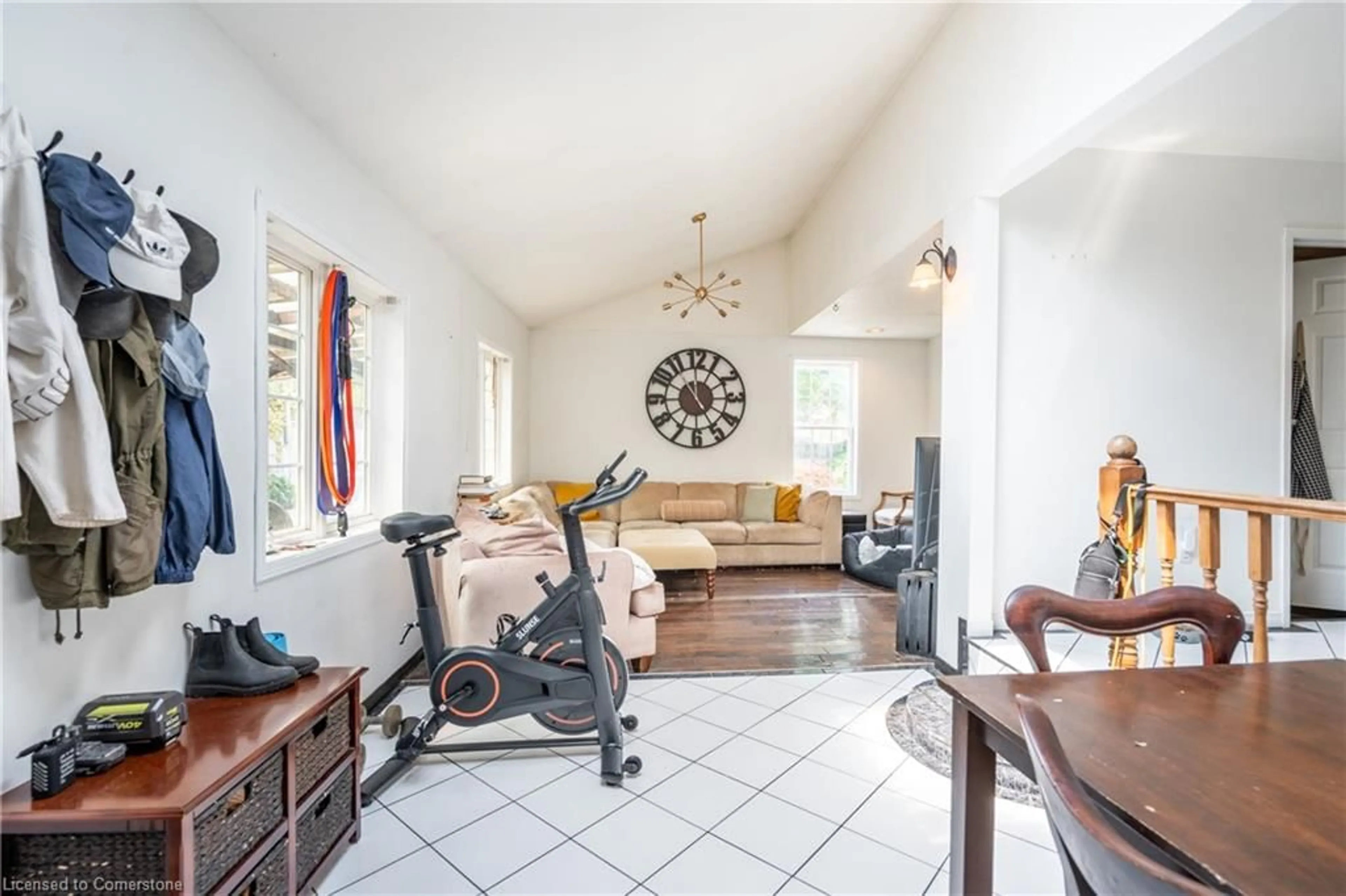 Living room with furniture, ceramic/tile floor for 209 Gibson Ave, Hamilton Ontario L8L 6K2