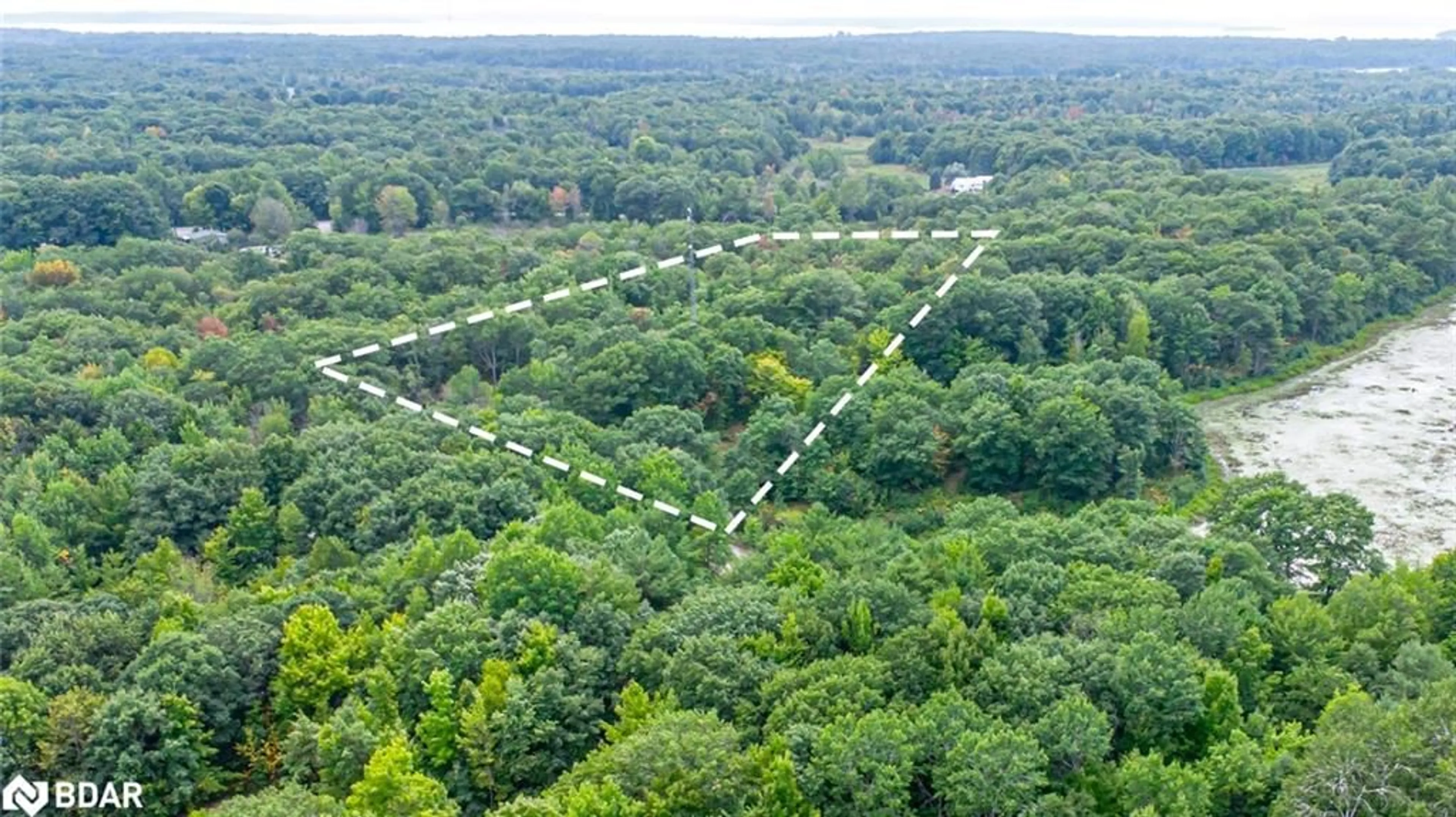 A pic from outside/outdoor area/front of a property/back of a property/a pic from drone, forest/trees view for LOT A 87 Corrievale Rd, Port Severn Ontario L0K 1S0