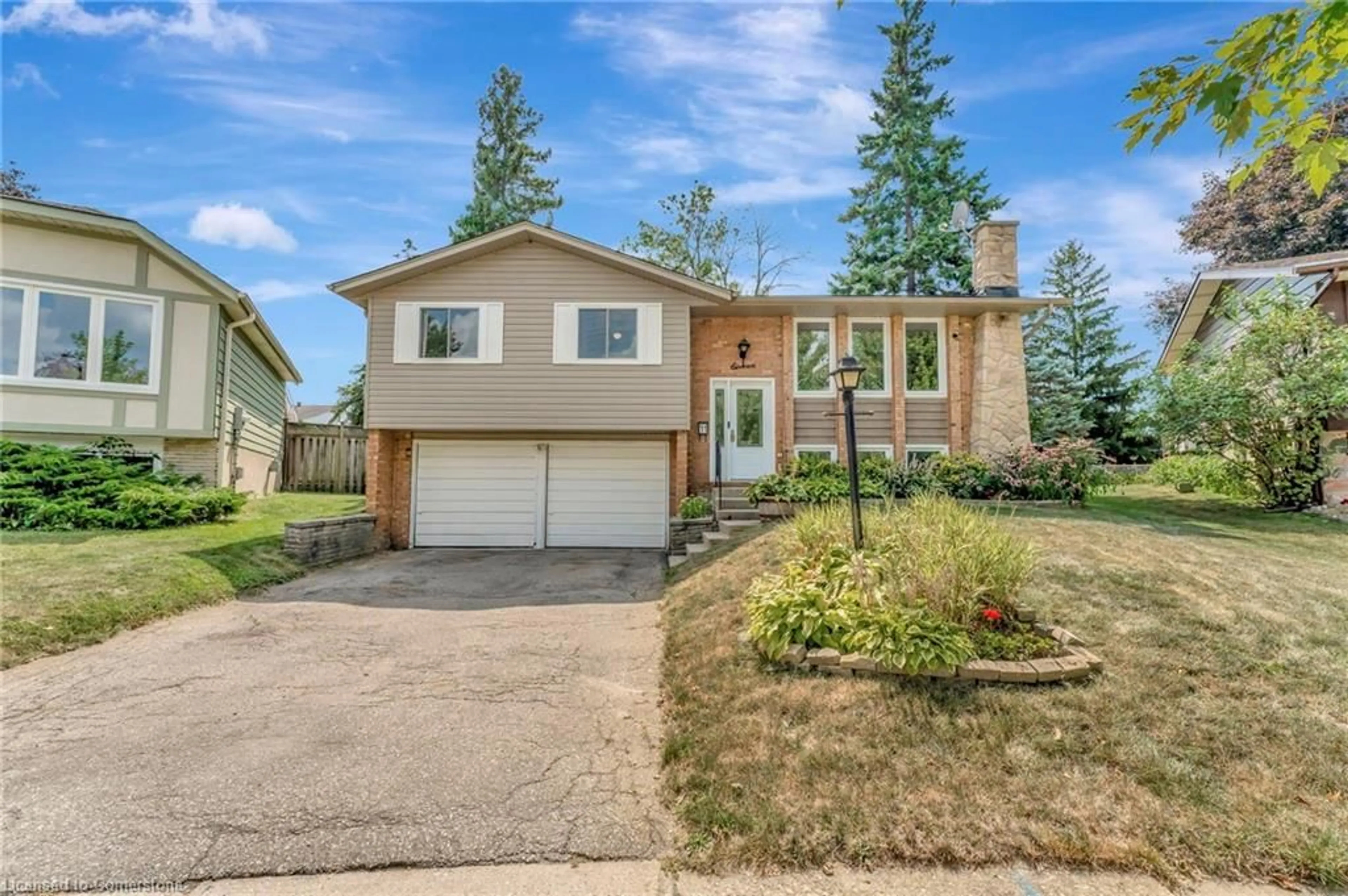 Home with vinyl exterior material, street for 11 Brassey Crt, Kitchener Ontario N2P 1J2