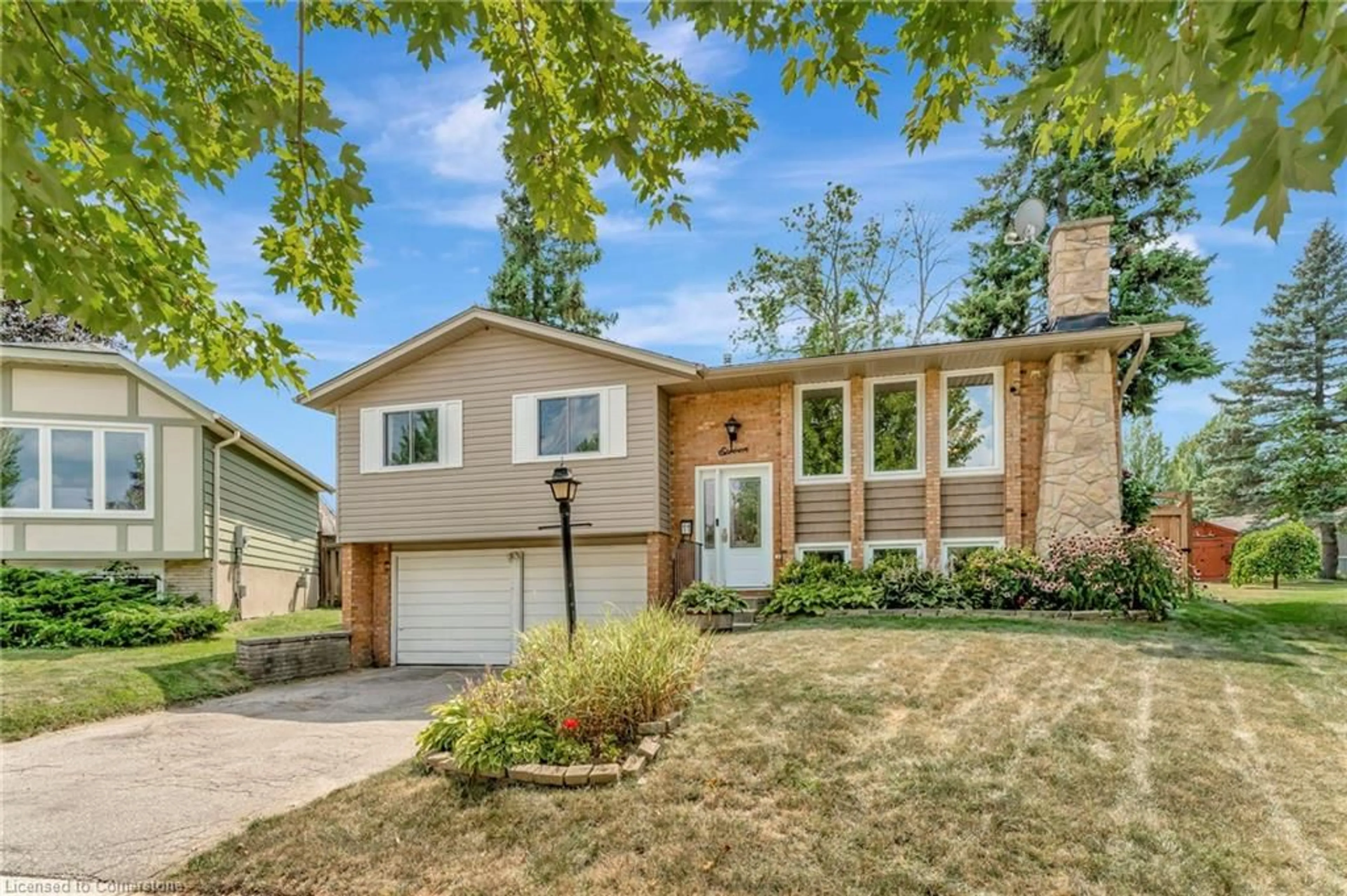 Home with brick exterior material, street for 11 Brassey Crt, Kitchener Ontario N2P 1J2