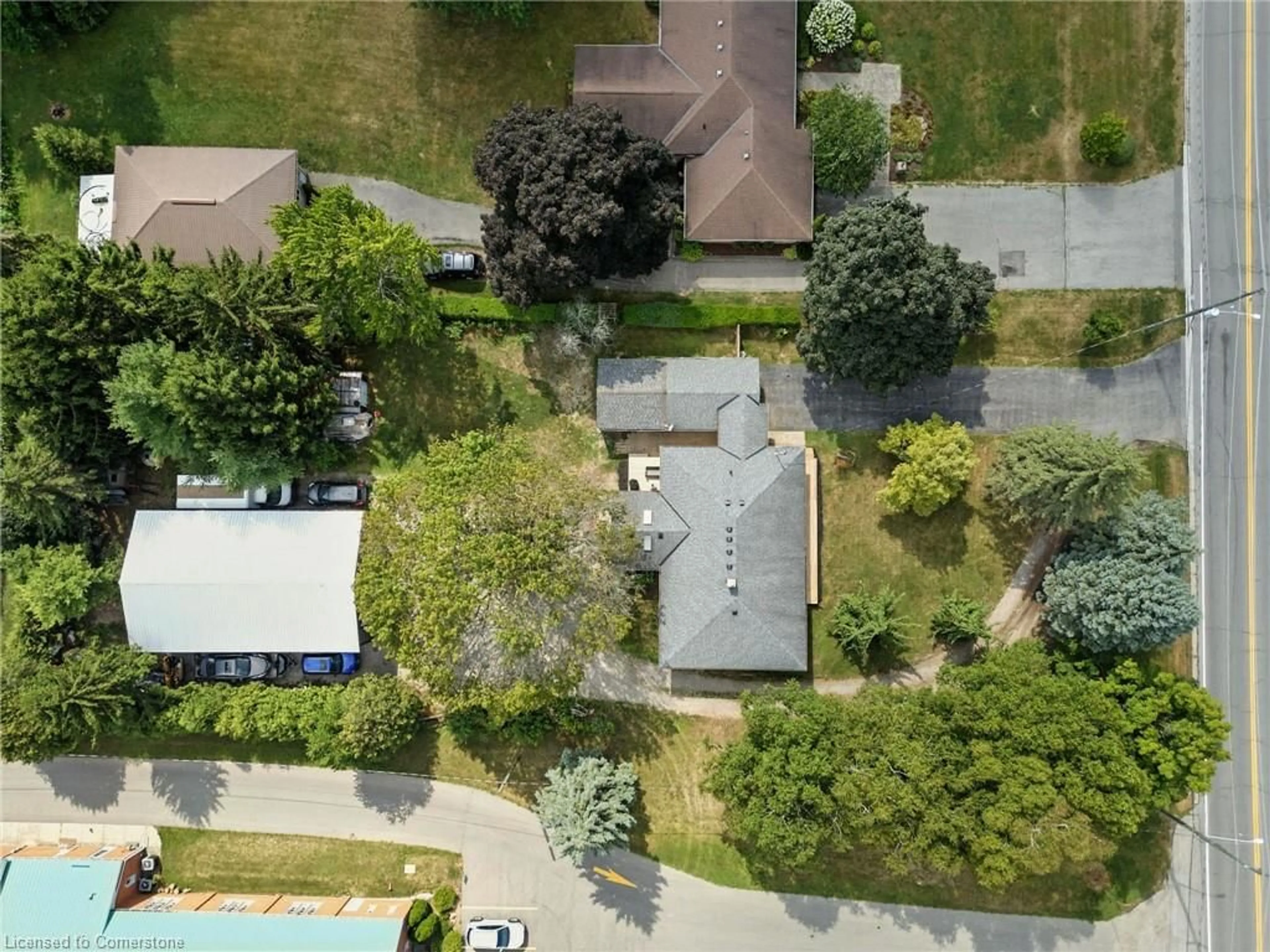 A pic from outside/outdoor area/front of a property/back of a property/a pic from drone, street for 69 King St, Burford Ontario N0E 1A0