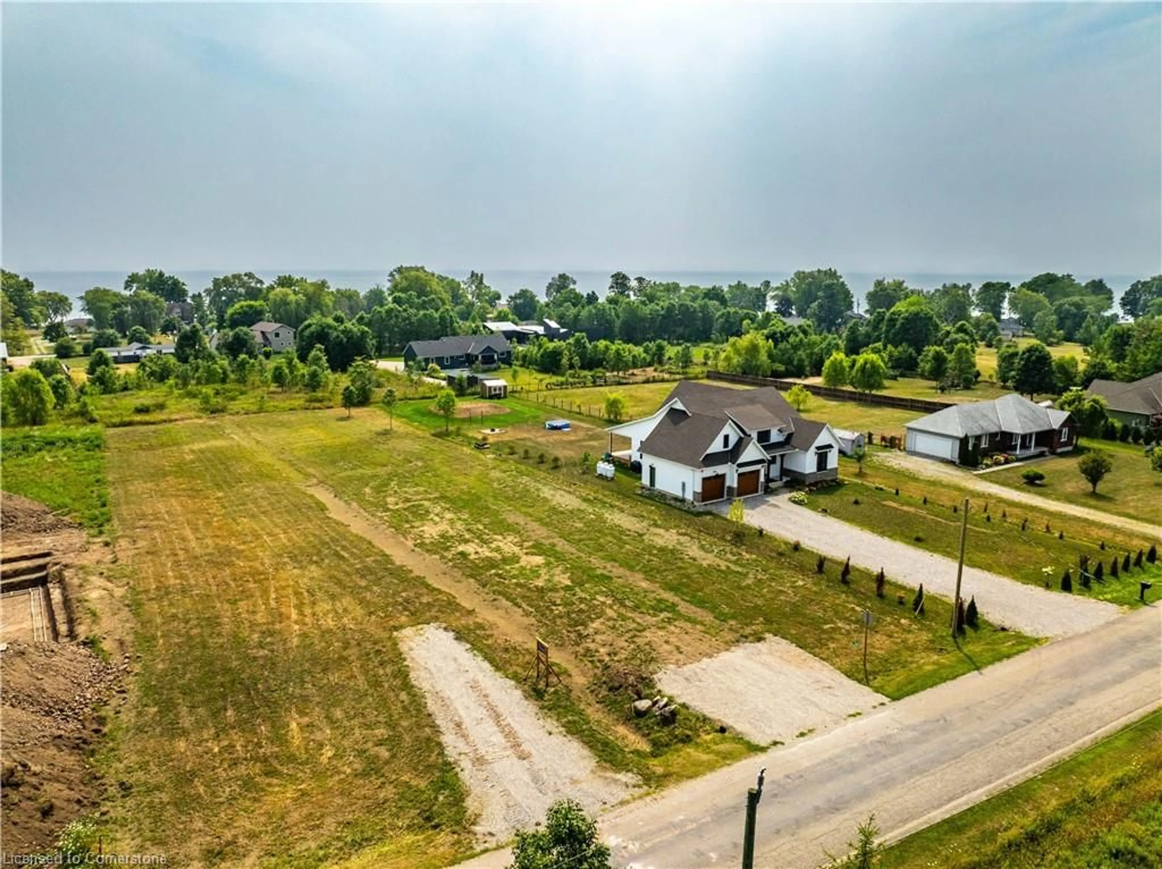 A pic from outside/outdoor area/front of a property/back of a property/a pic from drone, unknown for 3250 Lakeshore Rd, Dunneville Ontario N1A 2W8