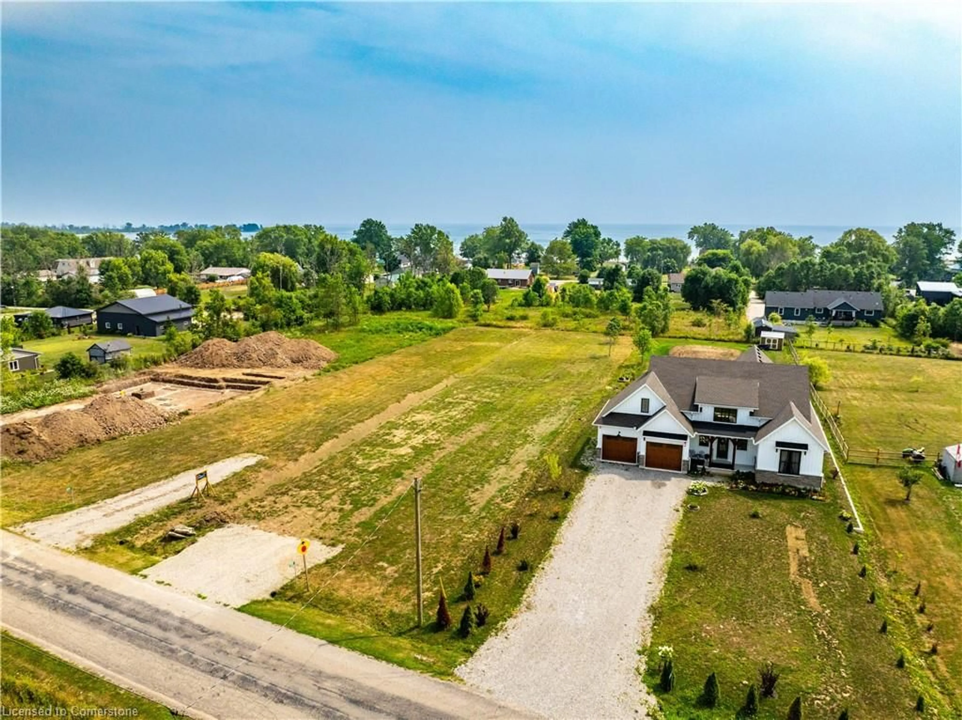 A pic from outside/outdoor area/front of a property/back of a property/a pic from drone, street for 3250 Lakeshore Rd, Dunneville Ontario N1A 2W8