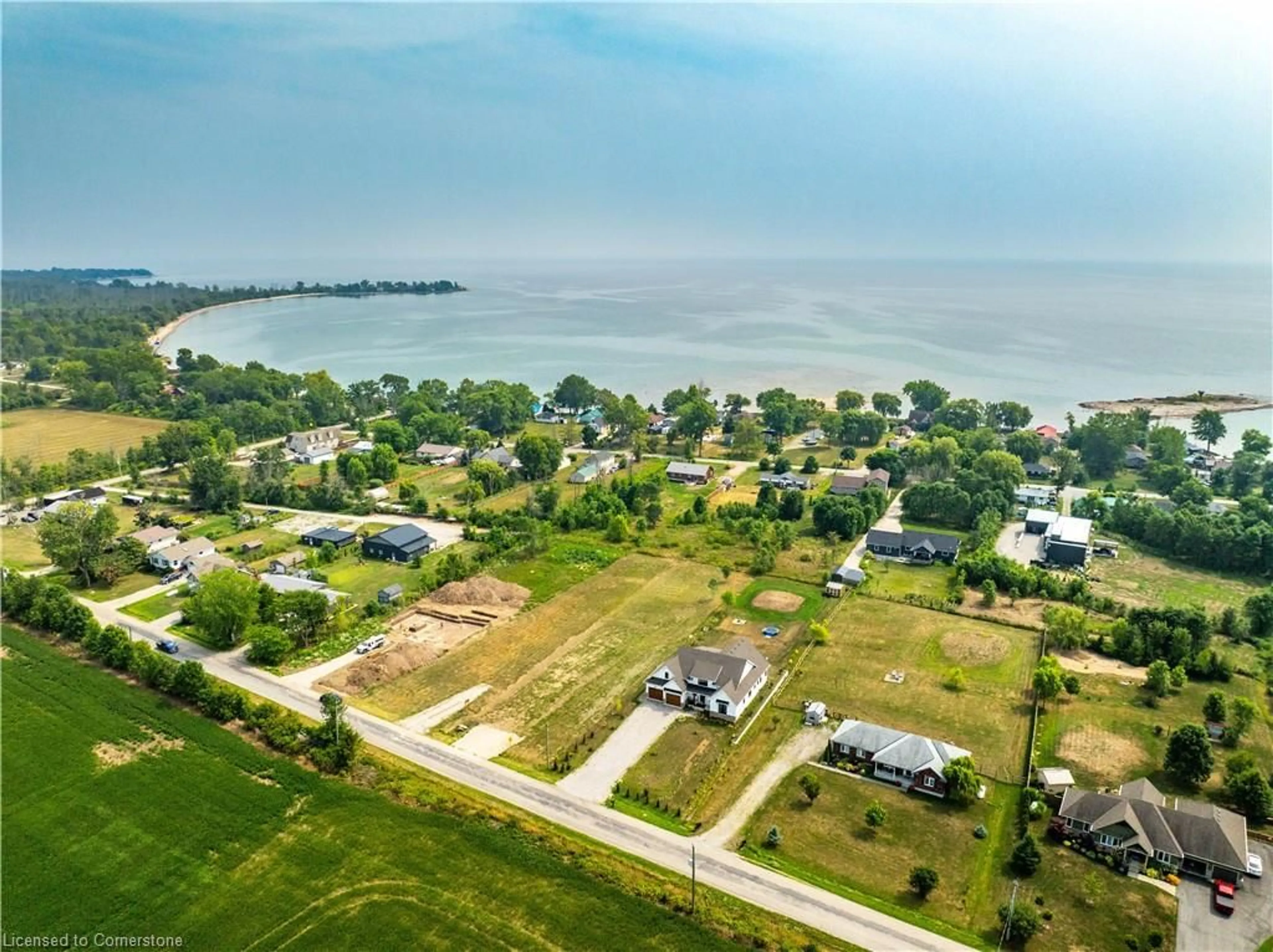 A pic from outside/outdoor area/front of a property/back of a property/a pic from drone, water/lake/river/ocean view for 3250 Lakeshore Rd, Dunneville Ontario N1A 2W8