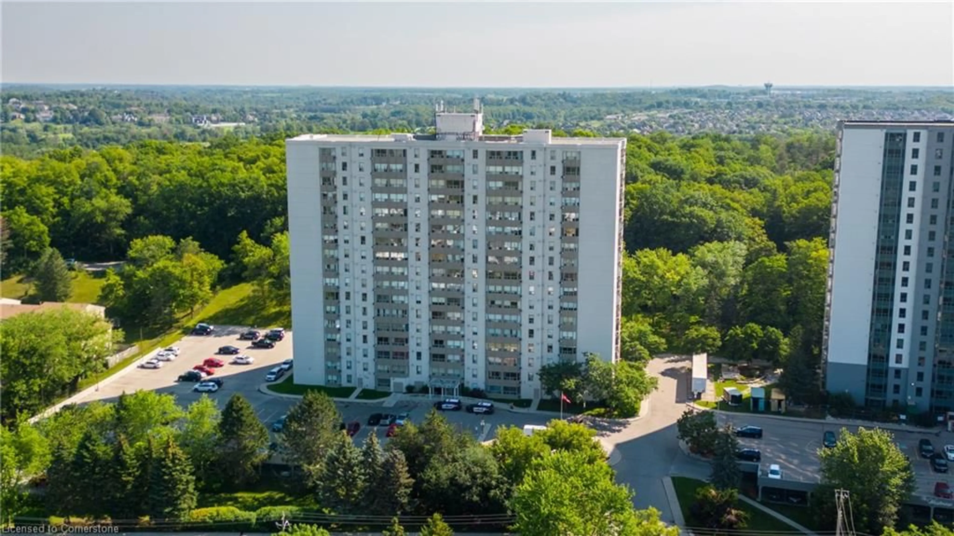 A pic from outside/outdoor area/front of a property/back of a property/a pic from drone, unknown for 35 Green Valley Dr #211, Kitchener Ontario N2P 2A5