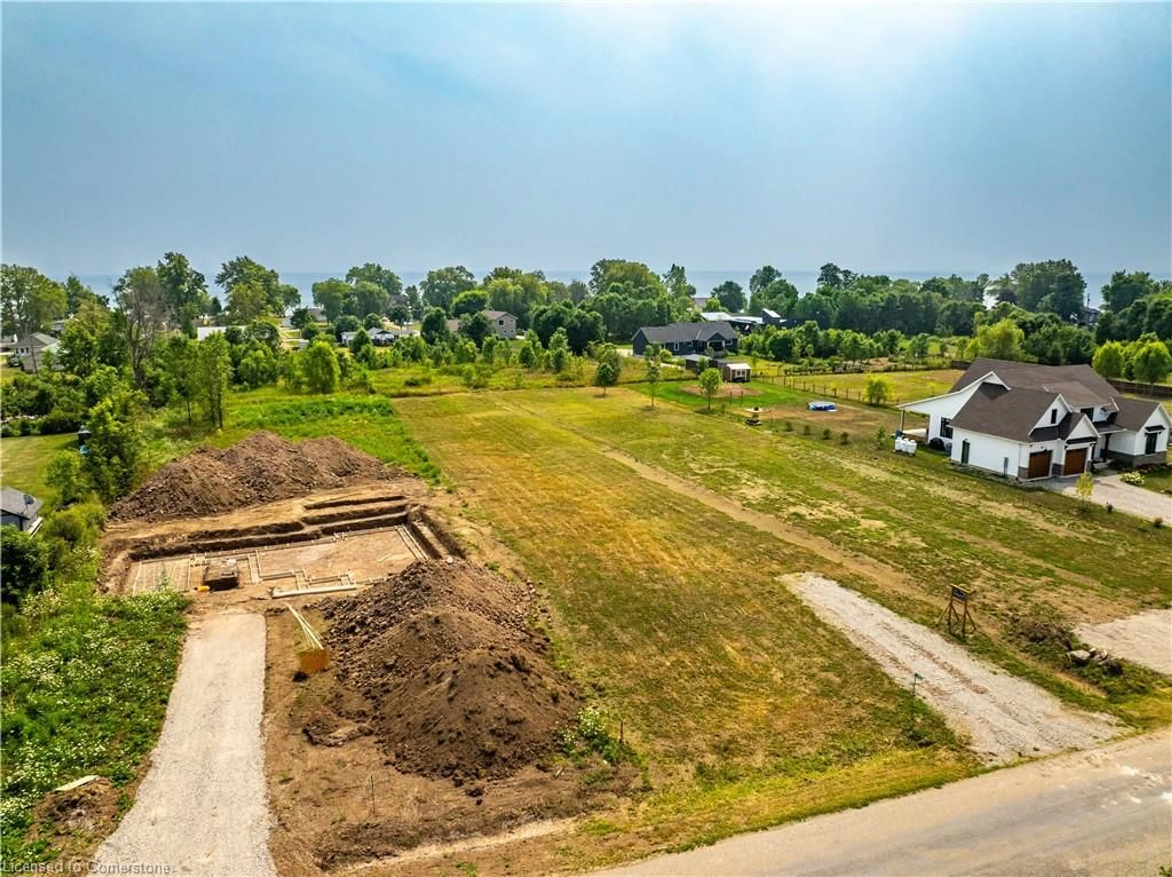 A pic from outside/outdoor area/front of a property/back of a property/a pic from drone, unknown for 3252 Lakeshore Rd, Dunneville Ontario N1A 2W8
