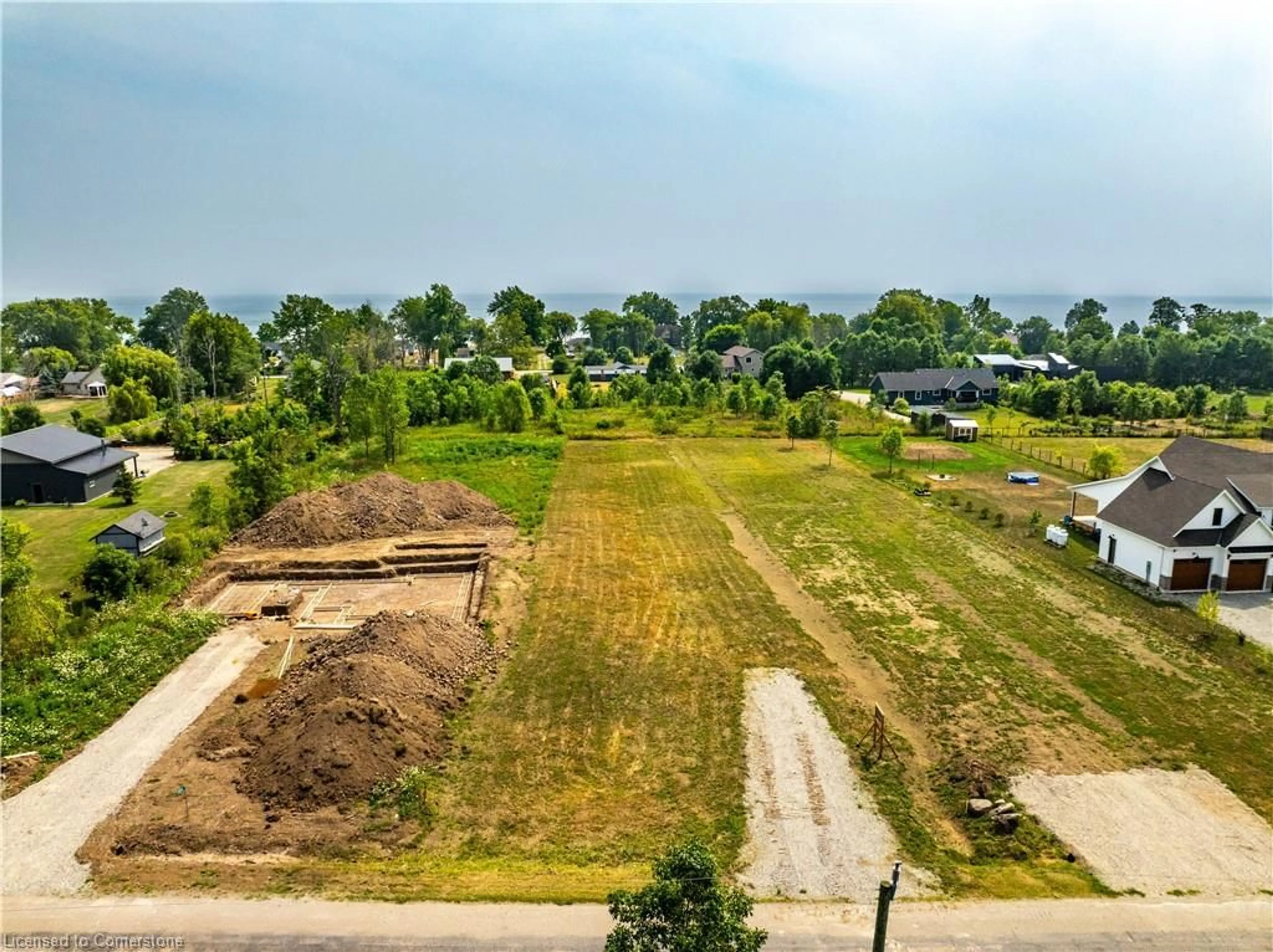 A pic from outside/outdoor area/front of a property/back of a property/a pic from drone, unknown for 3252 Lakeshore Rd, Dunneville Ontario N1A 2W8