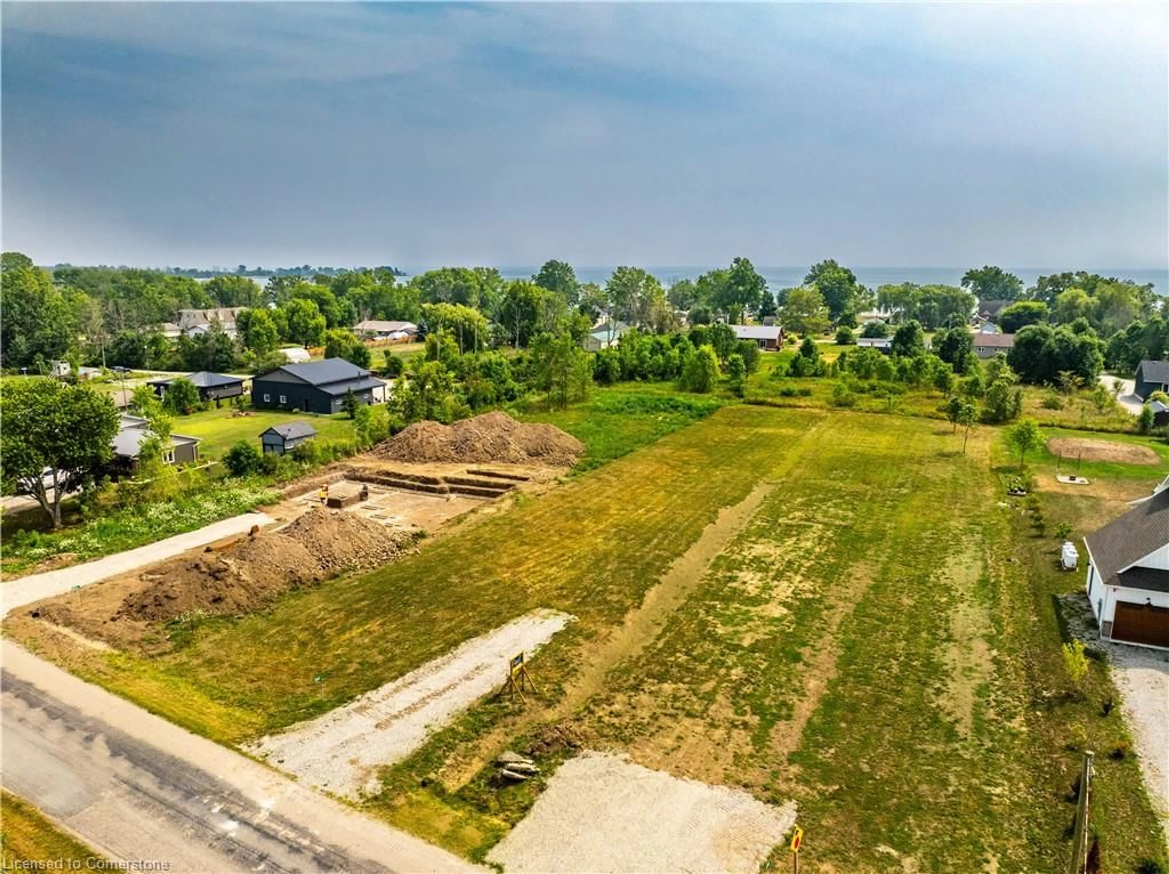 A pic from outside/outdoor area/front of a property/back of a property/a pic from drone, street for 3252 Lakeshore Rd, Dunneville Ontario N1A 2W8