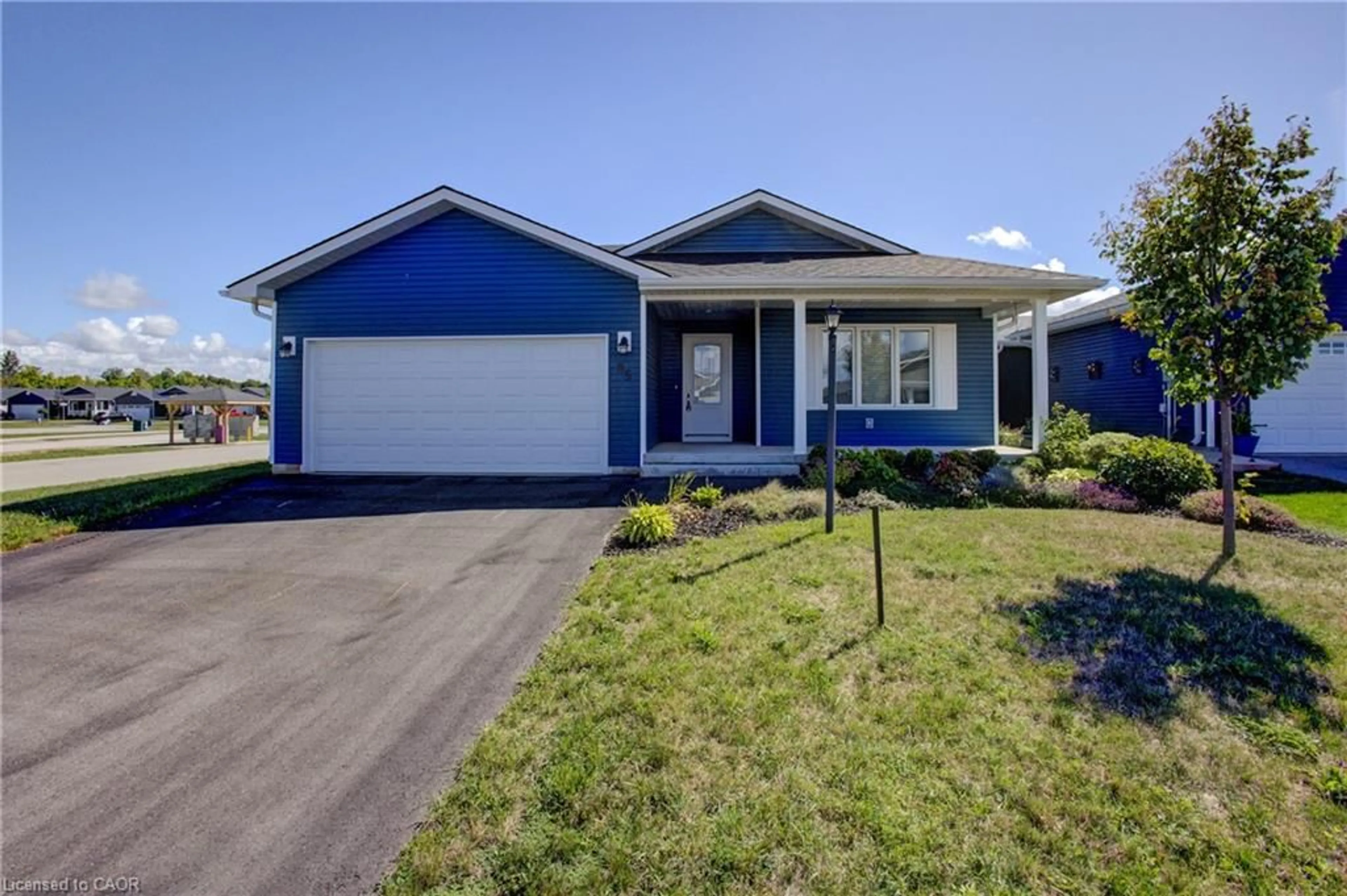 Home with vinyl exterior material, street for 85 Lake Breeze Dr, Ashfield-Colborne-Wawanosh Ontario N7A 0B9