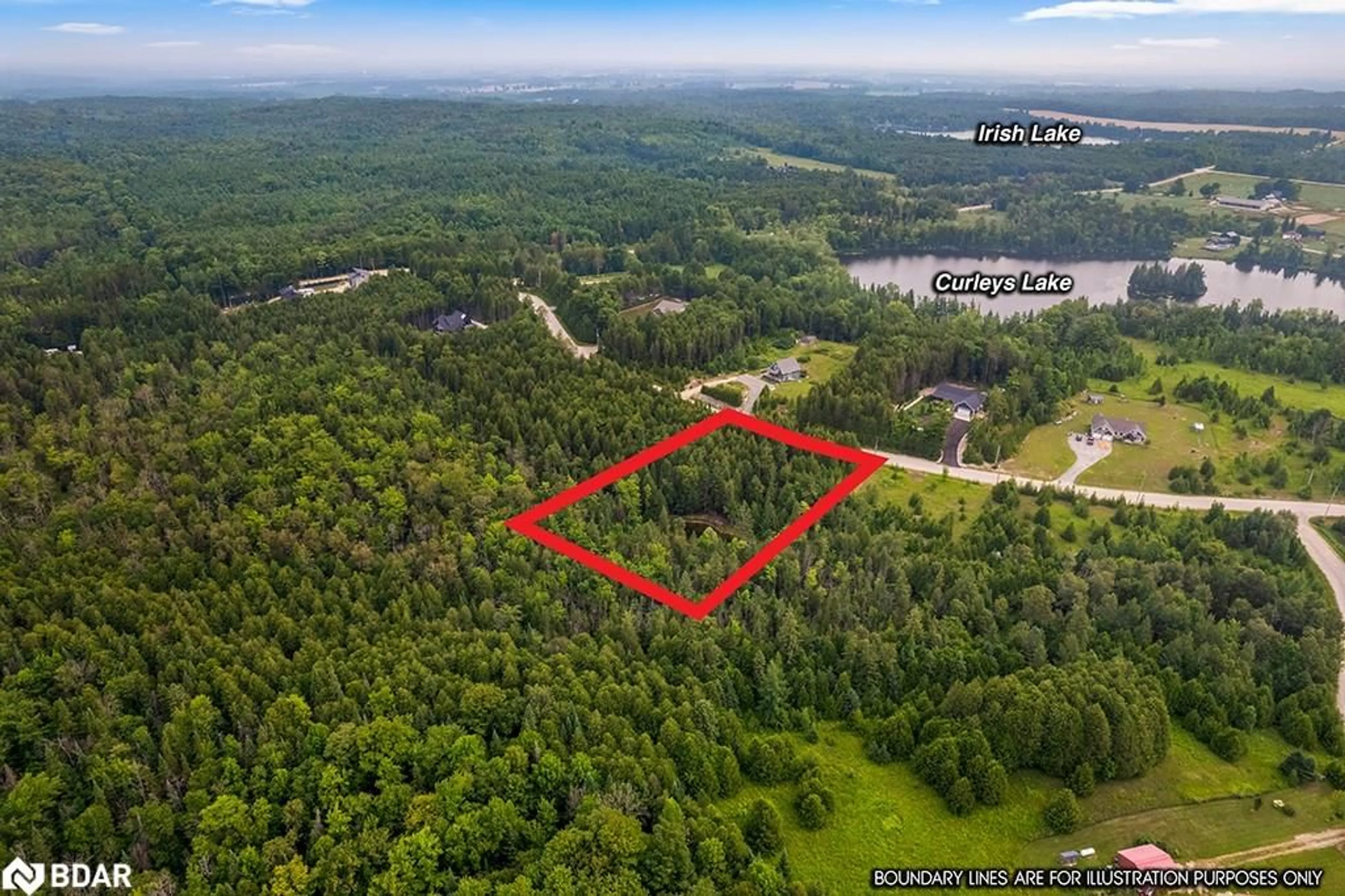 A pic from outside/outdoor area/front of a property/back of a property/a pic from drone, forest/trees view for 126 Highland Dr, Grey Ontario N0C 1H0