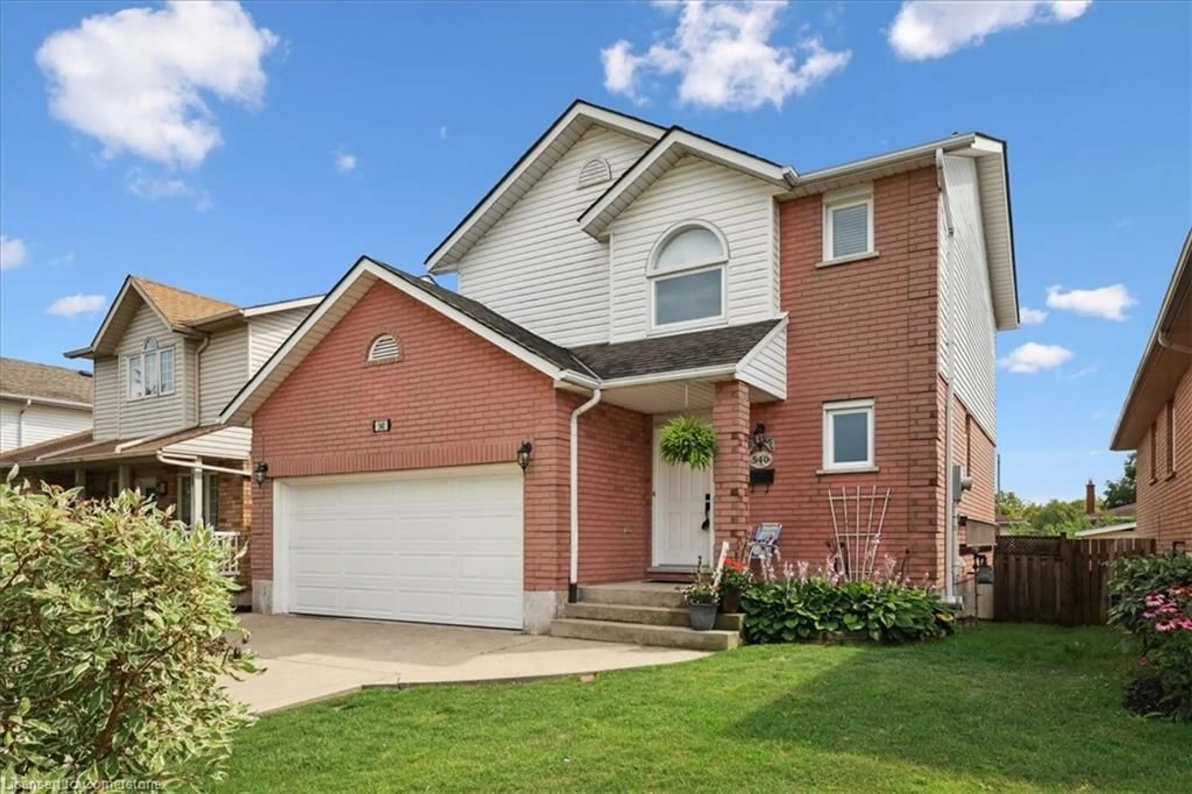 Home with brick exterior material, street for 540 Rexford Dr, Hamilton Ontario L8W 3C1
