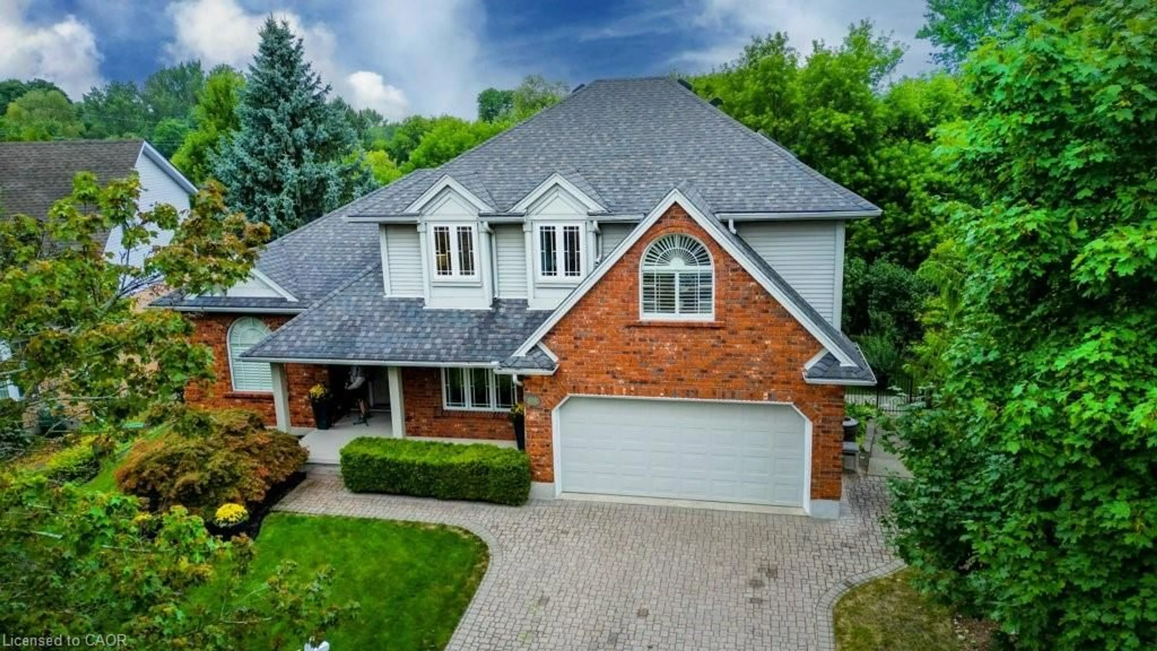 Home with brick exterior material, street for 516 Chancery Lane, Waterloo Ontario N2T 2N4