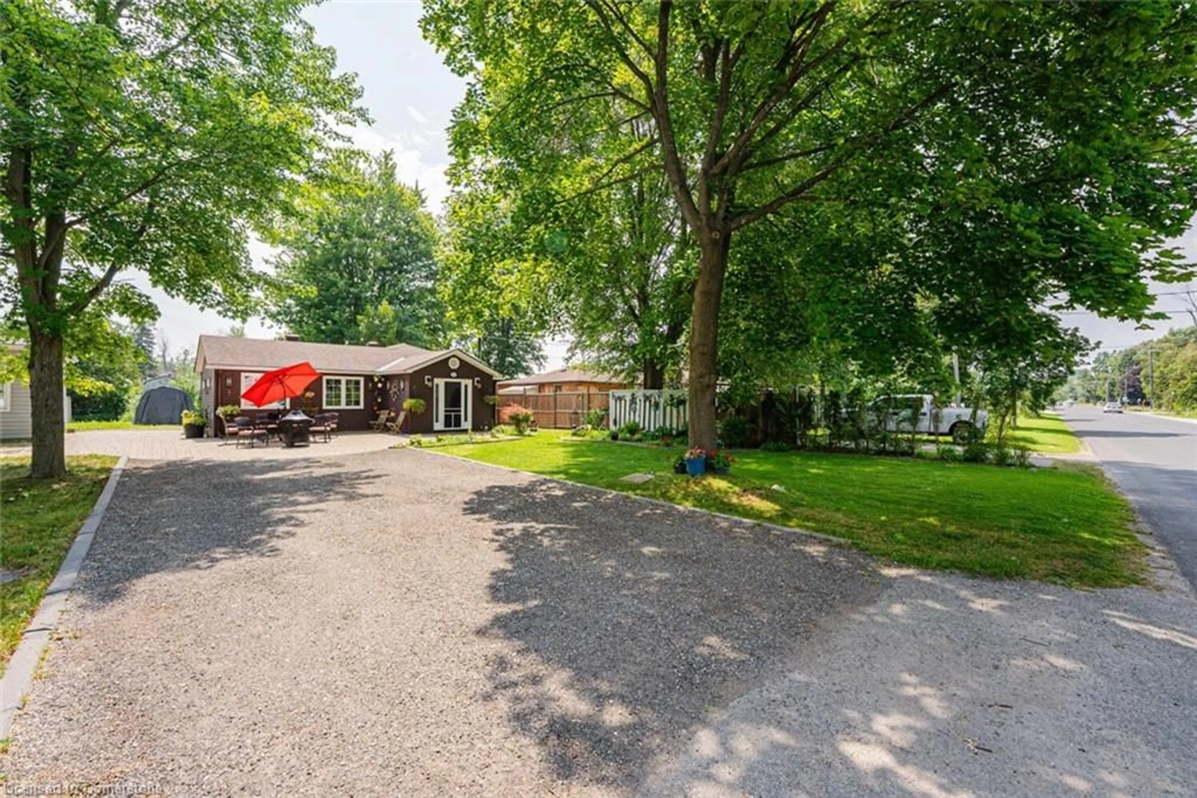 A pic from outside/outdoor area/front of a property/back of a property/a pic from drone, street for 1127 Shore Acres Dr, Innisfil Ontario L0L 1R0