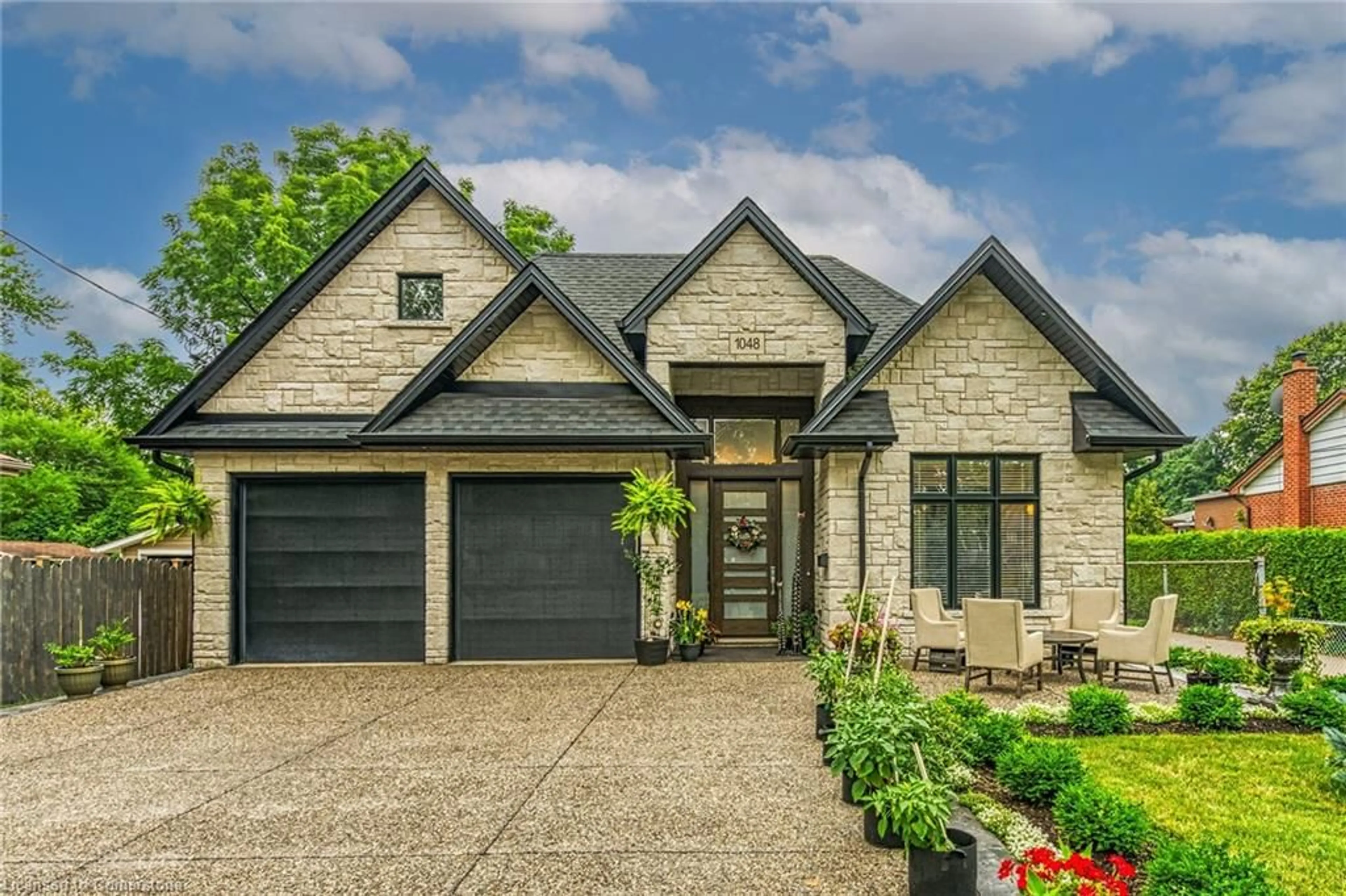 Home with brick exterior material, street for 1048 Dovercourt Ave, Burlington Ontario L7T 3C2