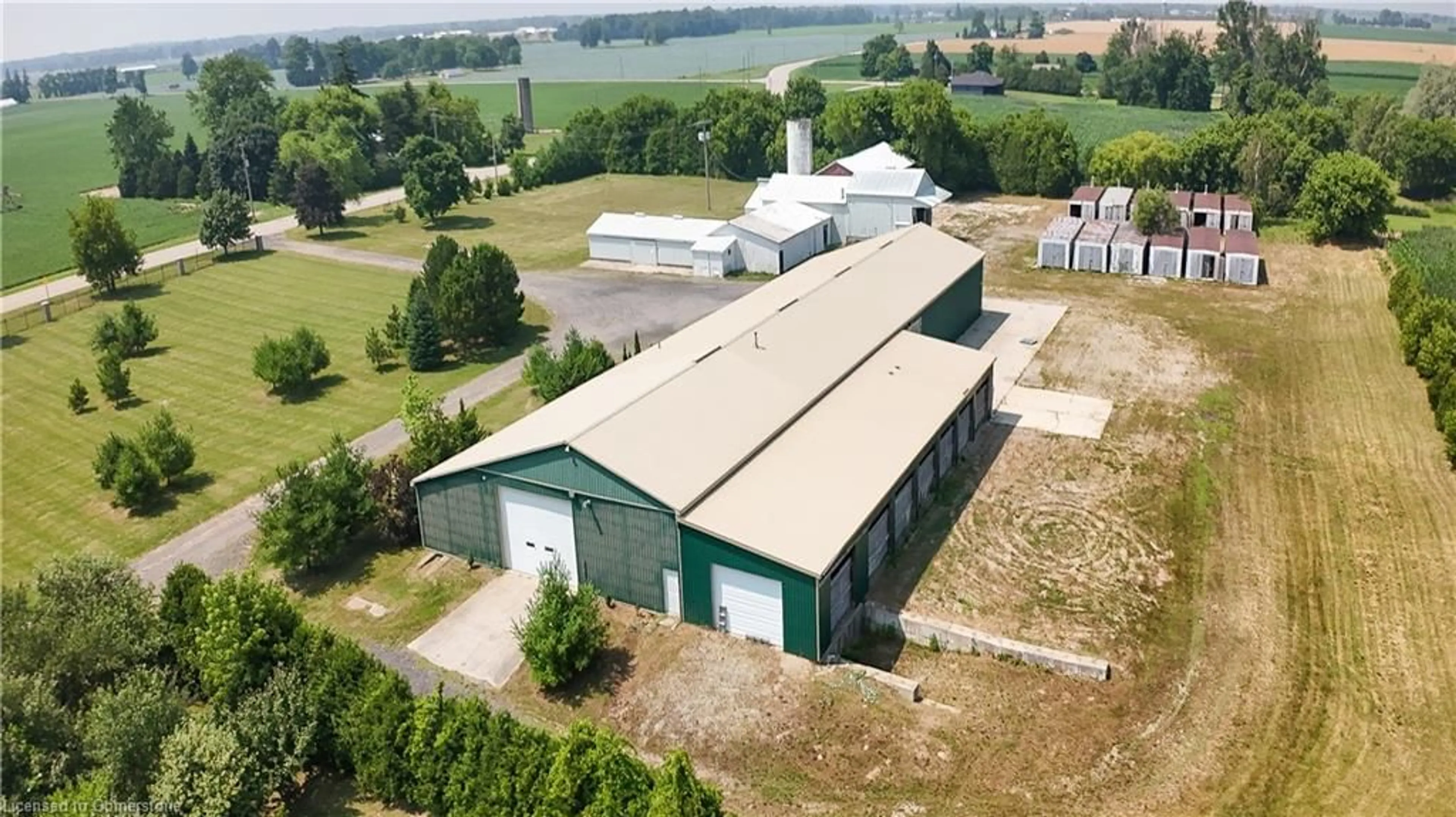 A pic from outside/outdoor area/front of a property/back of a property/a pic from drone, building for 214 & 218 Maple Ave, Burford Ontario N0E 1A0