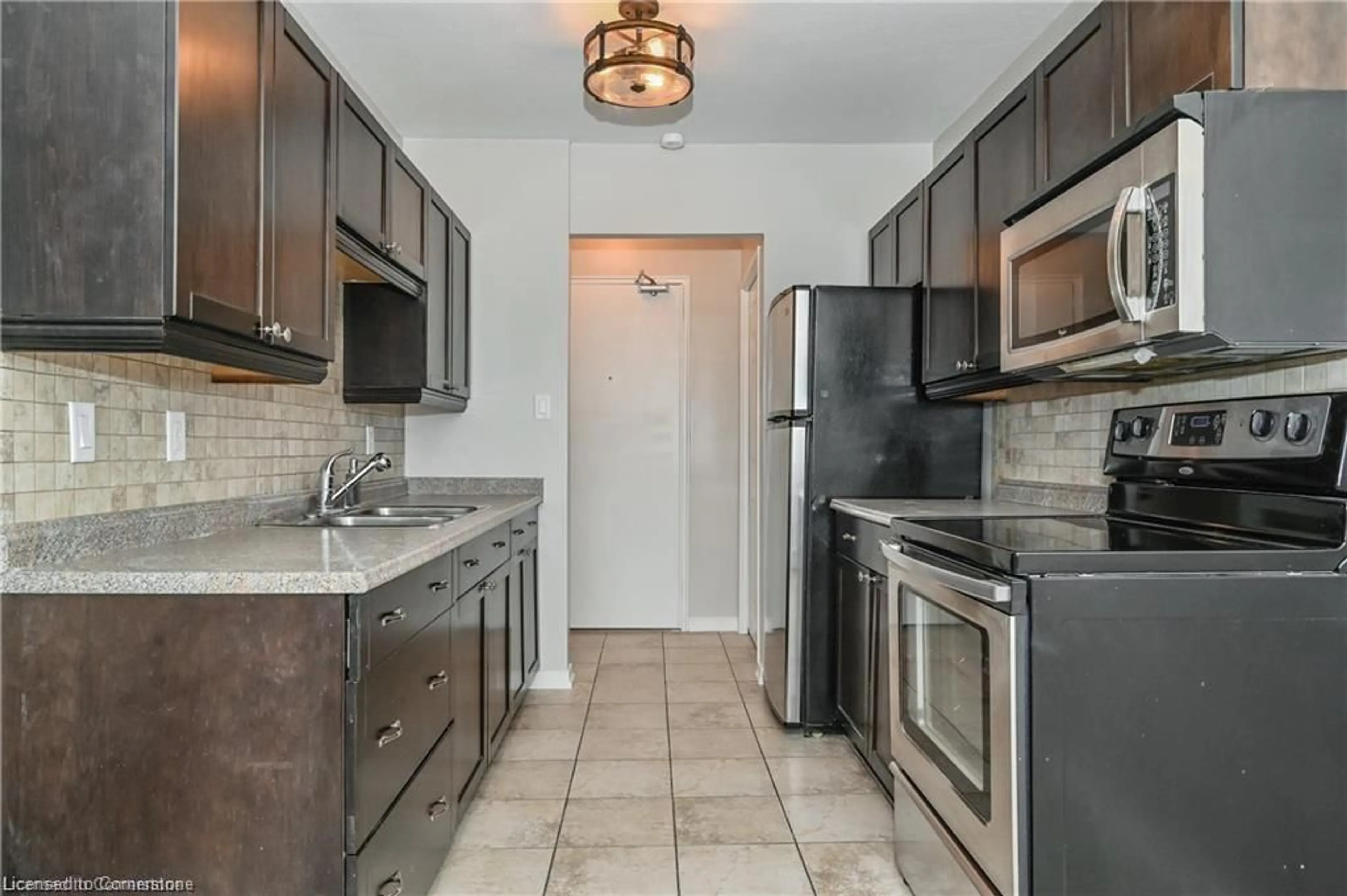 Standard kitchen, ceramic/tile floor for 283 Fairway Rd #101, Kitchener Ontario N2A 2P1