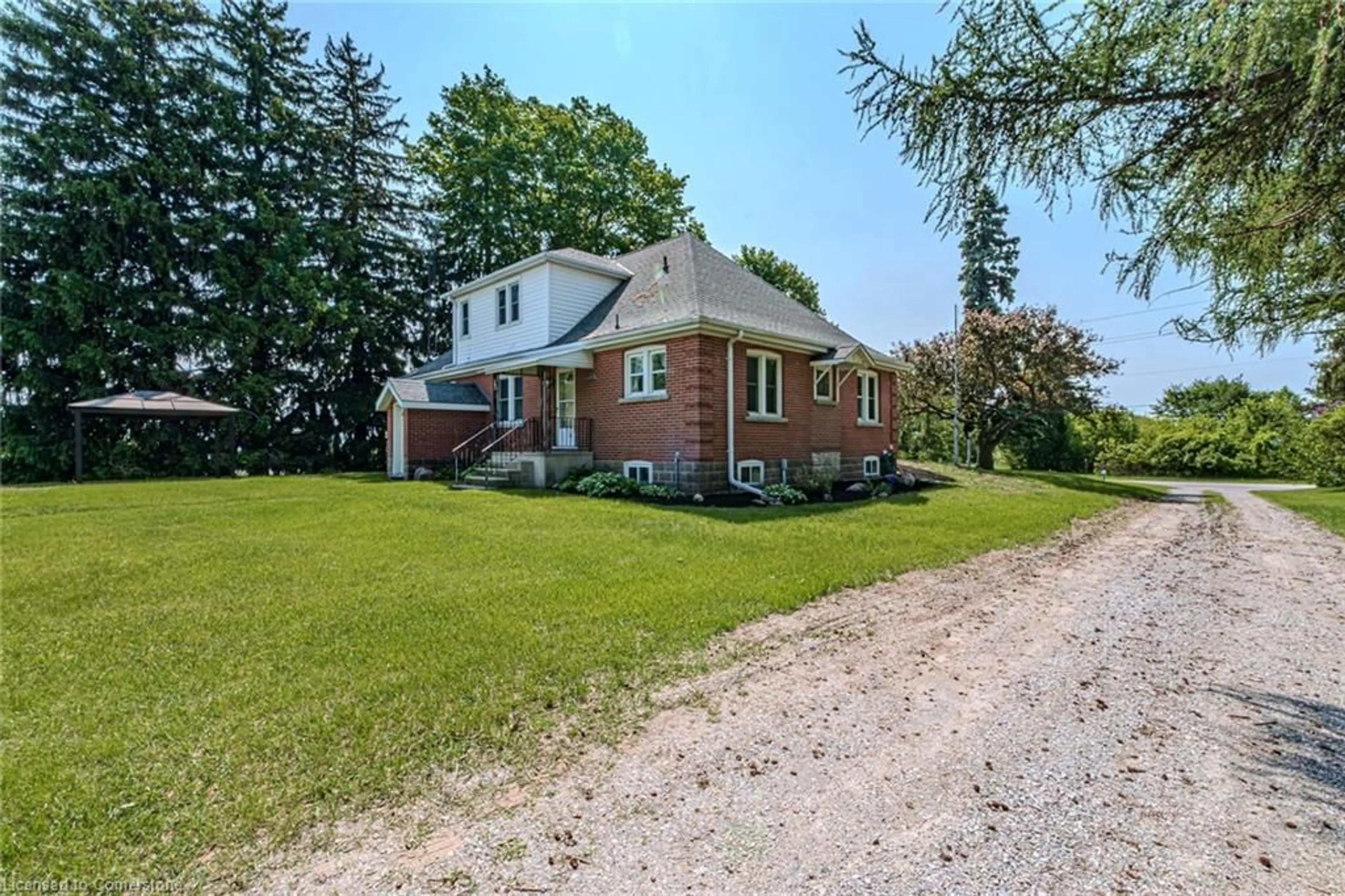 Home with brick exterior material, street for 573 Highway 6, Port Dover Ontario N0A 1N2