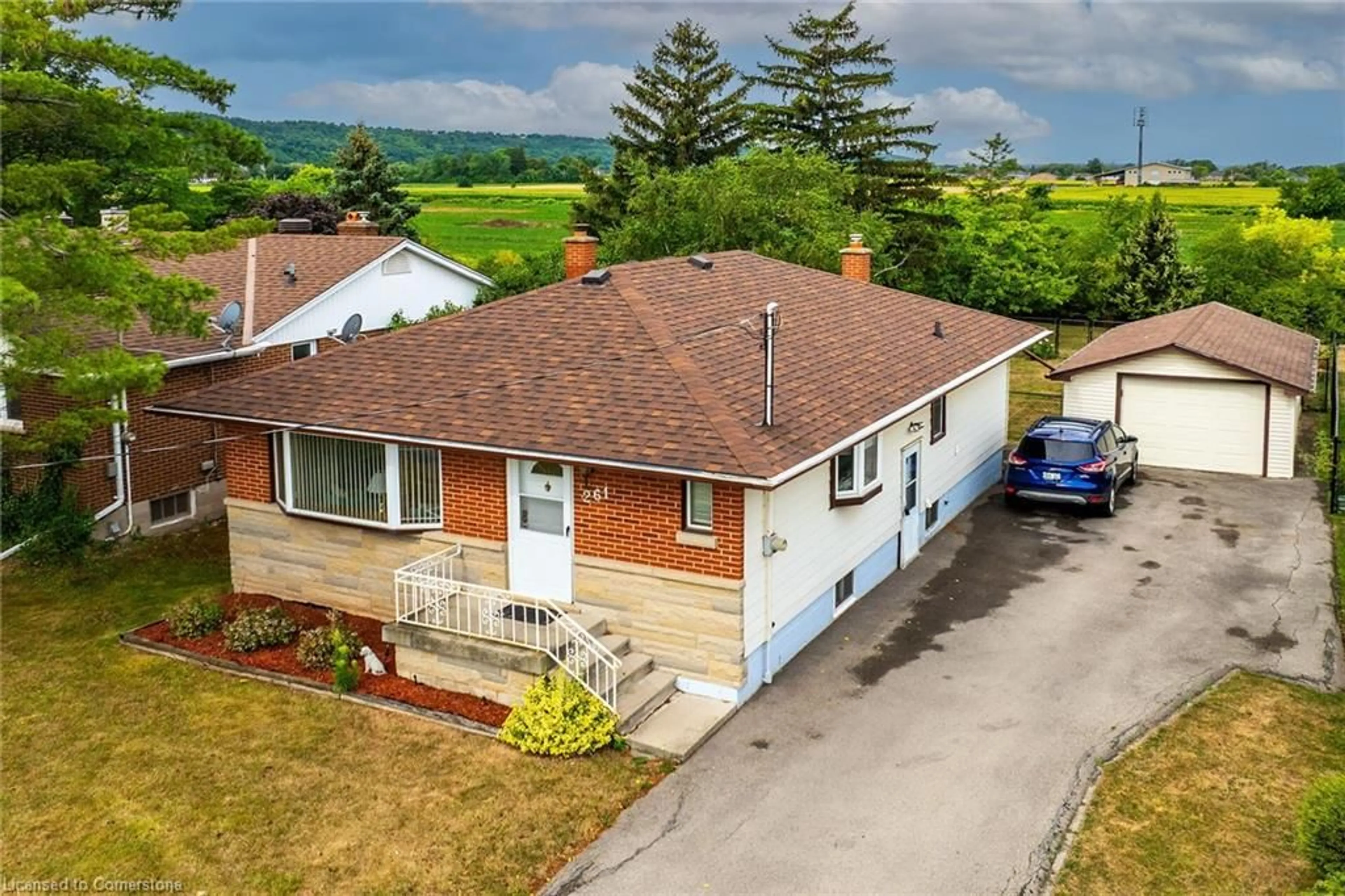 A pic from outside/outdoor area/front of a property/back of a property/a pic from drone, street for 261 Mcneilly Rd, Stoney Creek Ontario L8E 5H2