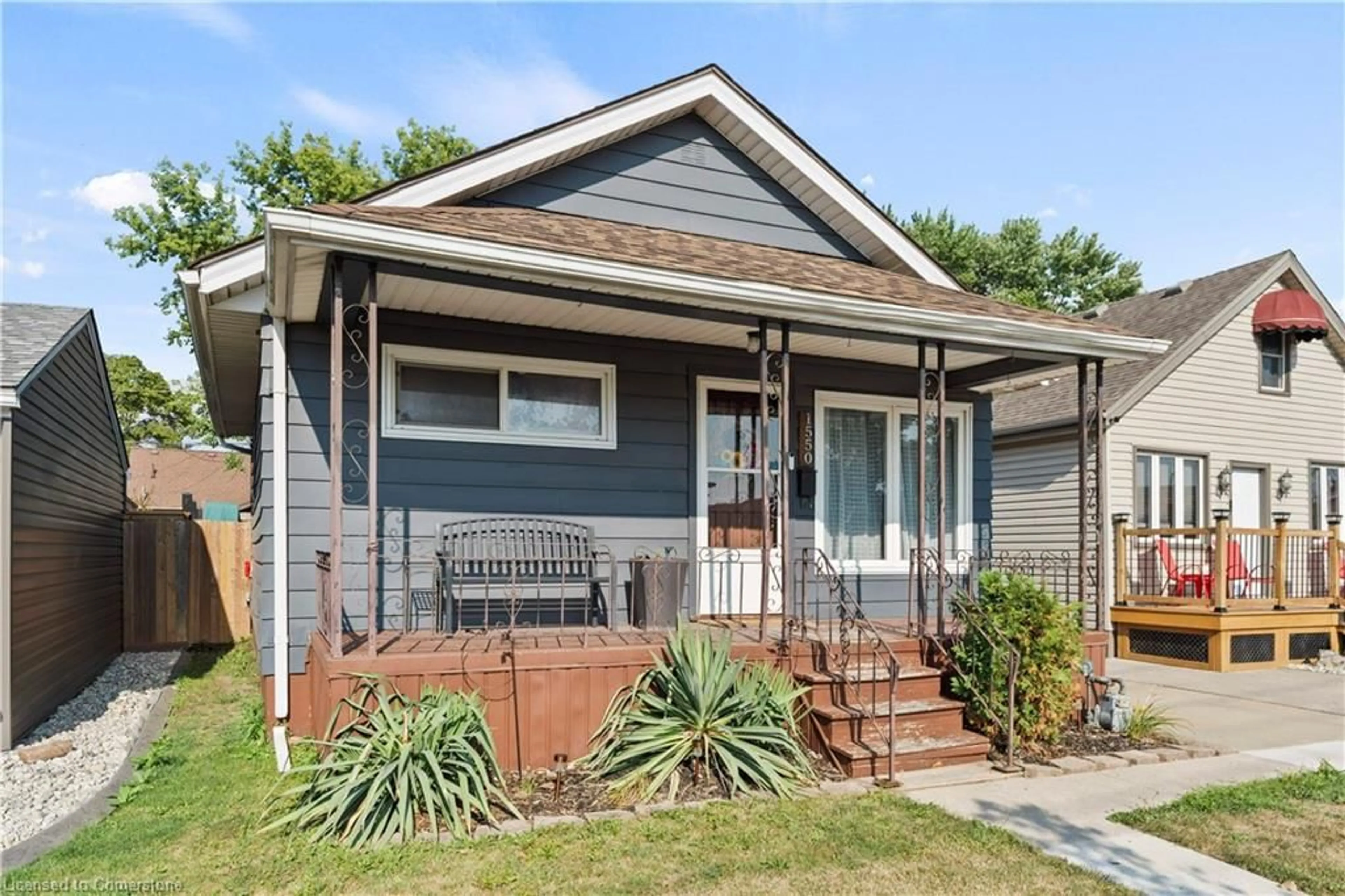 Home with vinyl exterior material, street for 1550 St Luke Rd, Windsor Ontario N8Y 3N3