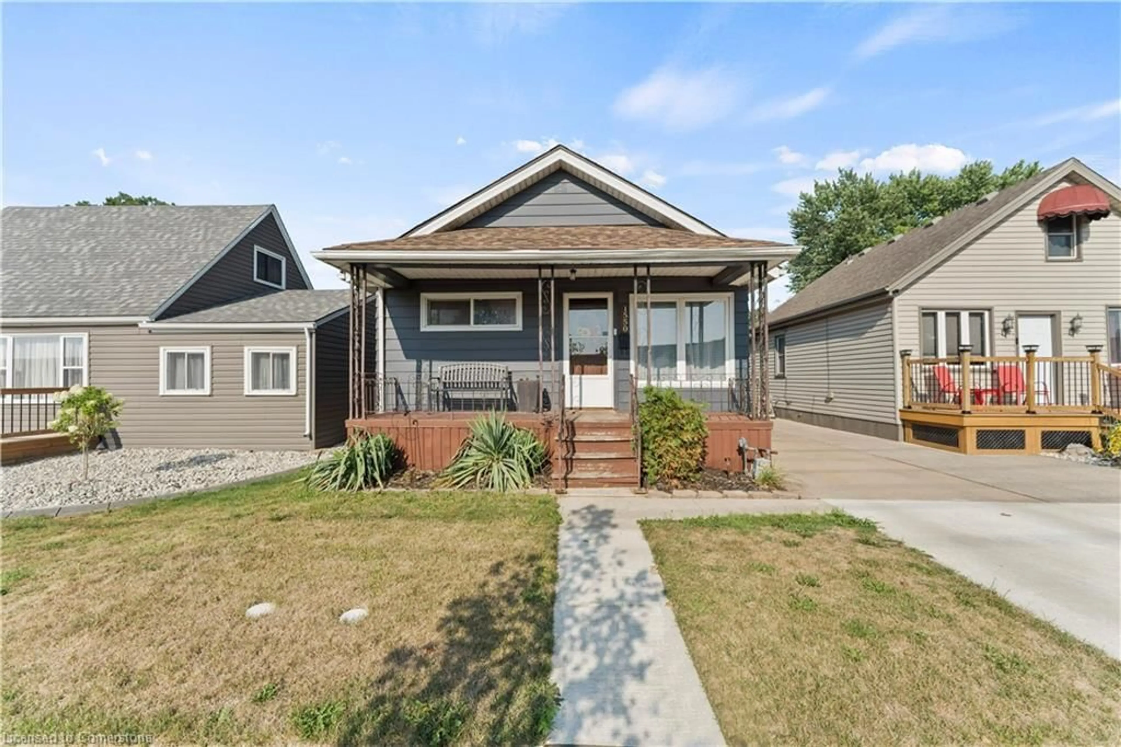 Home with vinyl exterior material, street for 1550 St Luke Rd, Windsor Ontario N8Y 3N3