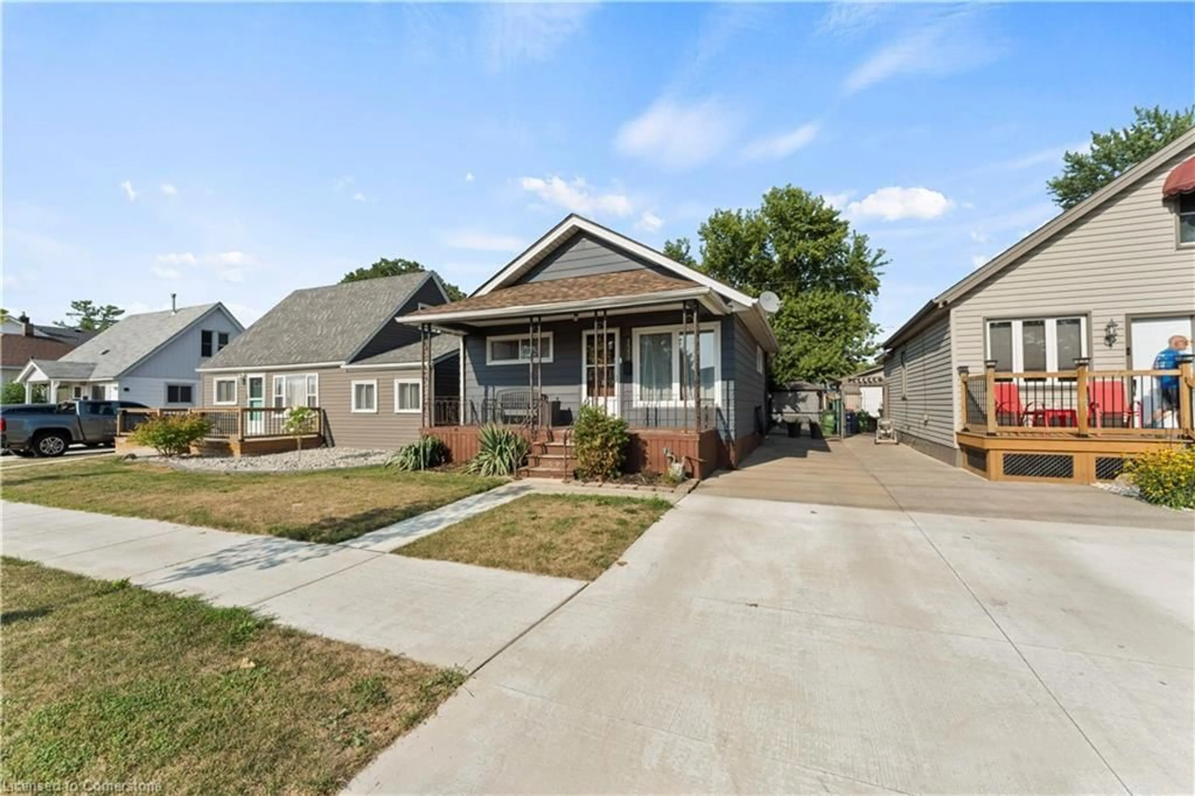 Home with vinyl exterior material, street for 1550 St Luke Rd, Windsor Ontario N8Y 3N3