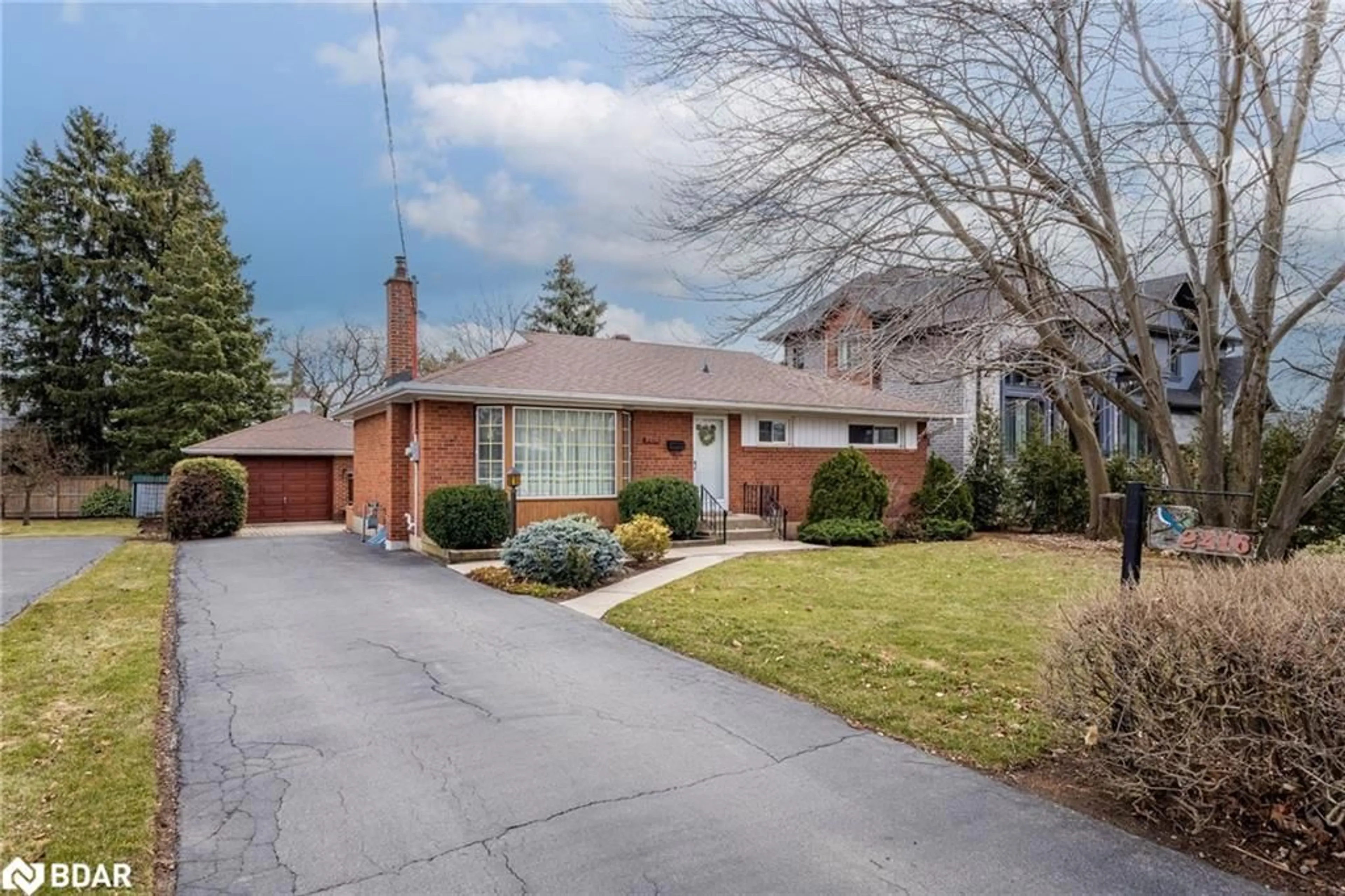 Home with brick exterior material, street for 2416 Rebecca St, Oakville Ontario L6L 2B2