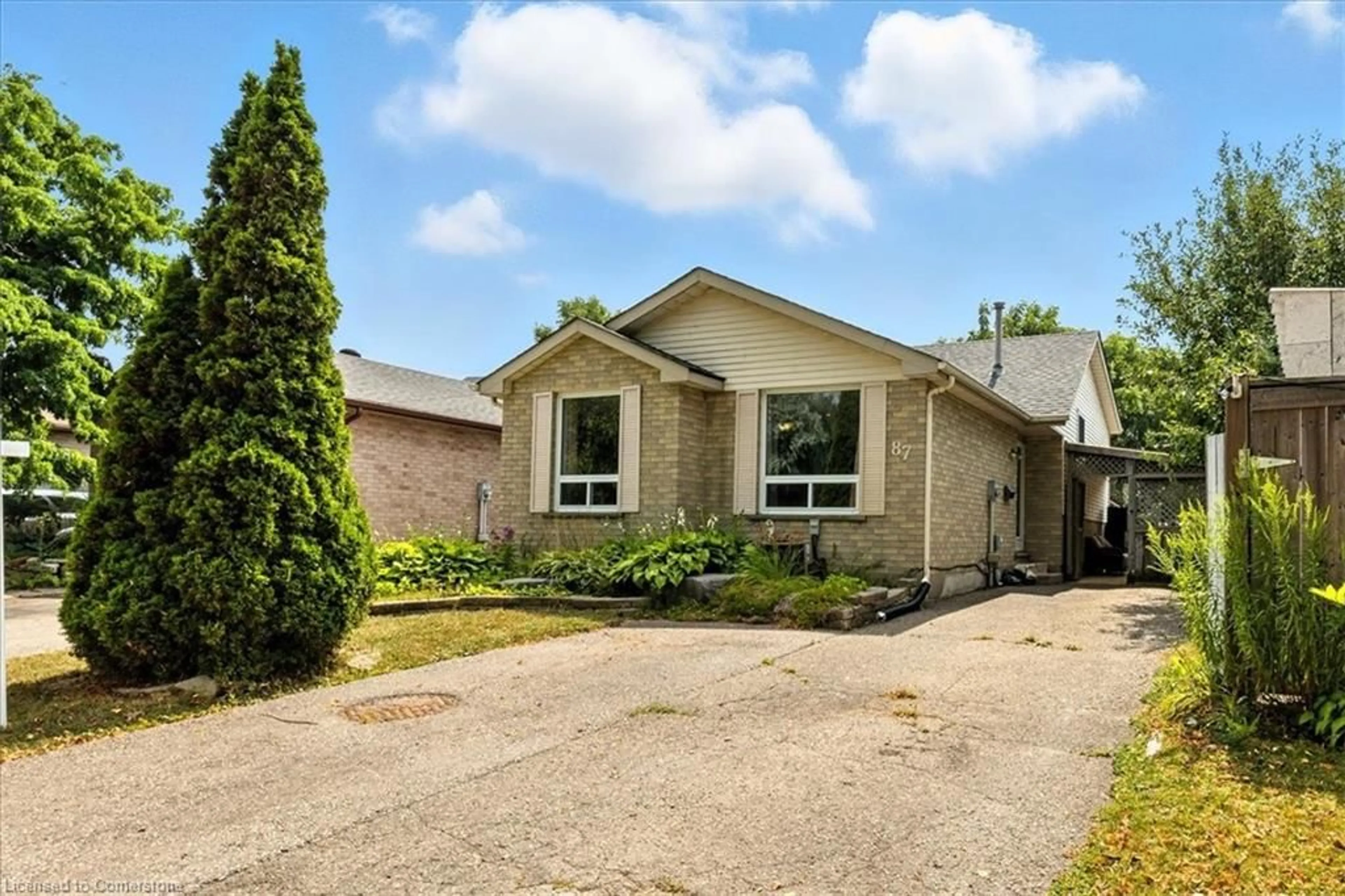 Home with brick exterior material, street for 87 Old Carriage Dr, Kitchener Ontario N2P 1H5