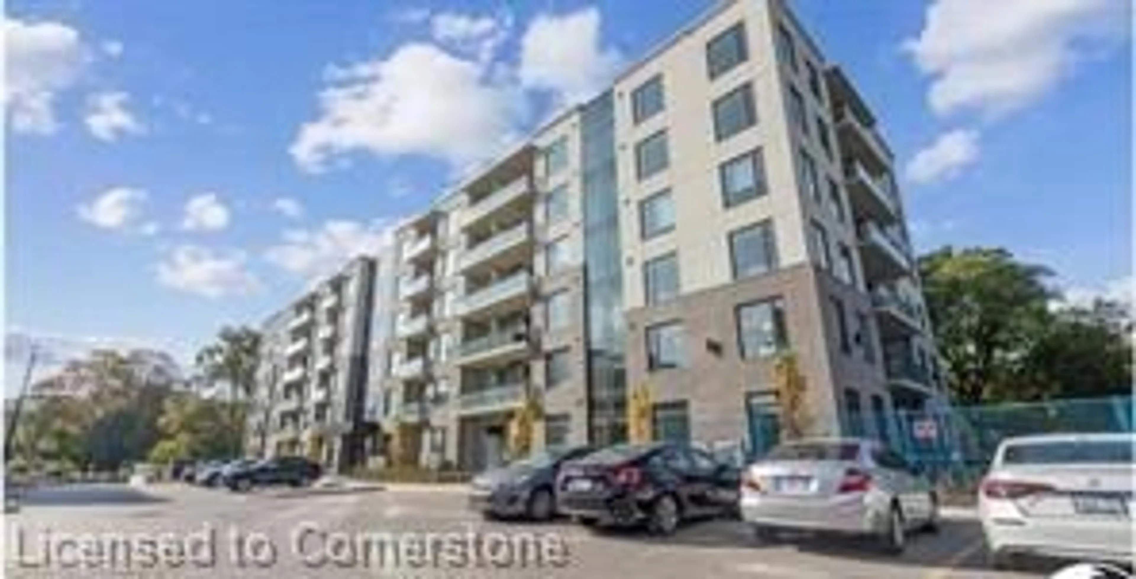 A pic from outside/outdoor area/front of a property/back of a property/a pic from drone, street for 103 Roger St #306, Waterloo Ontario N2J 0G2