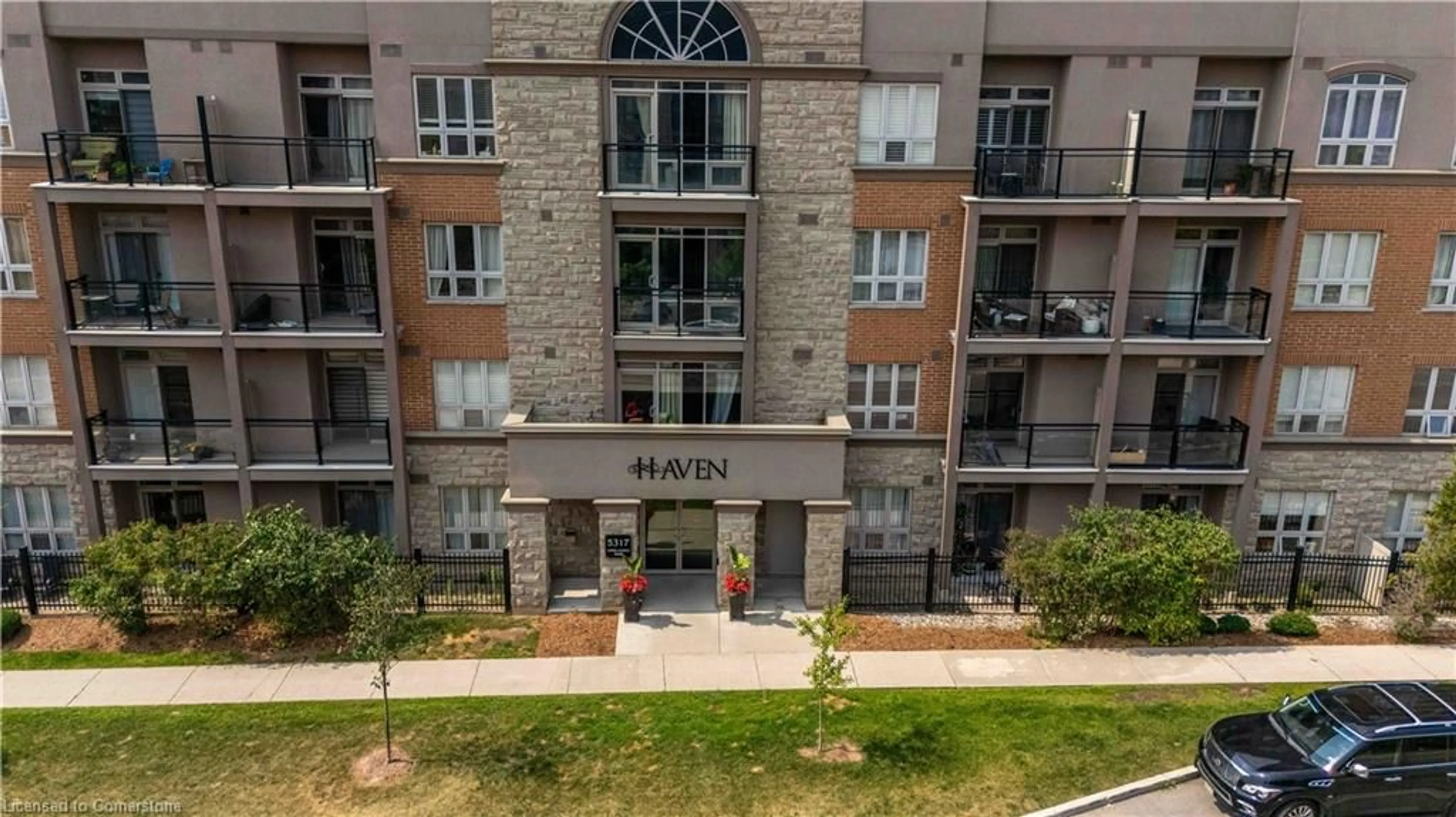 A pic from outside/outdoor area/front of a property/back of a property/a pic from drone, city buildings view from balcony for 5317 Upper Middle Rd #422, Burlington Ontario L7L 0G8