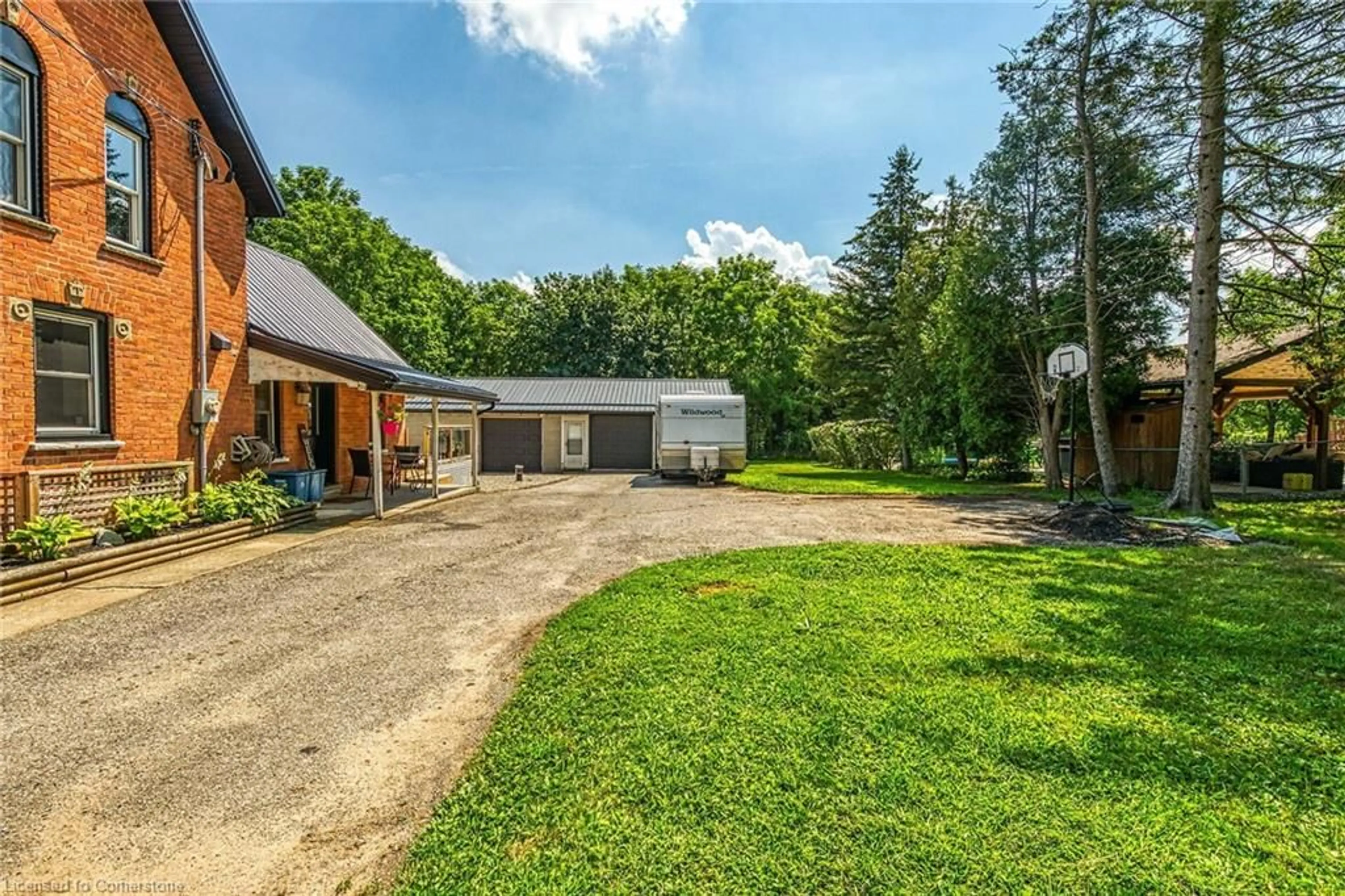 A pic from outside/outdoor area/front of a property/back of a property/a pic from drone, unknown for 110 Woodley Rd, Waterford Ontario N0E 1Y0