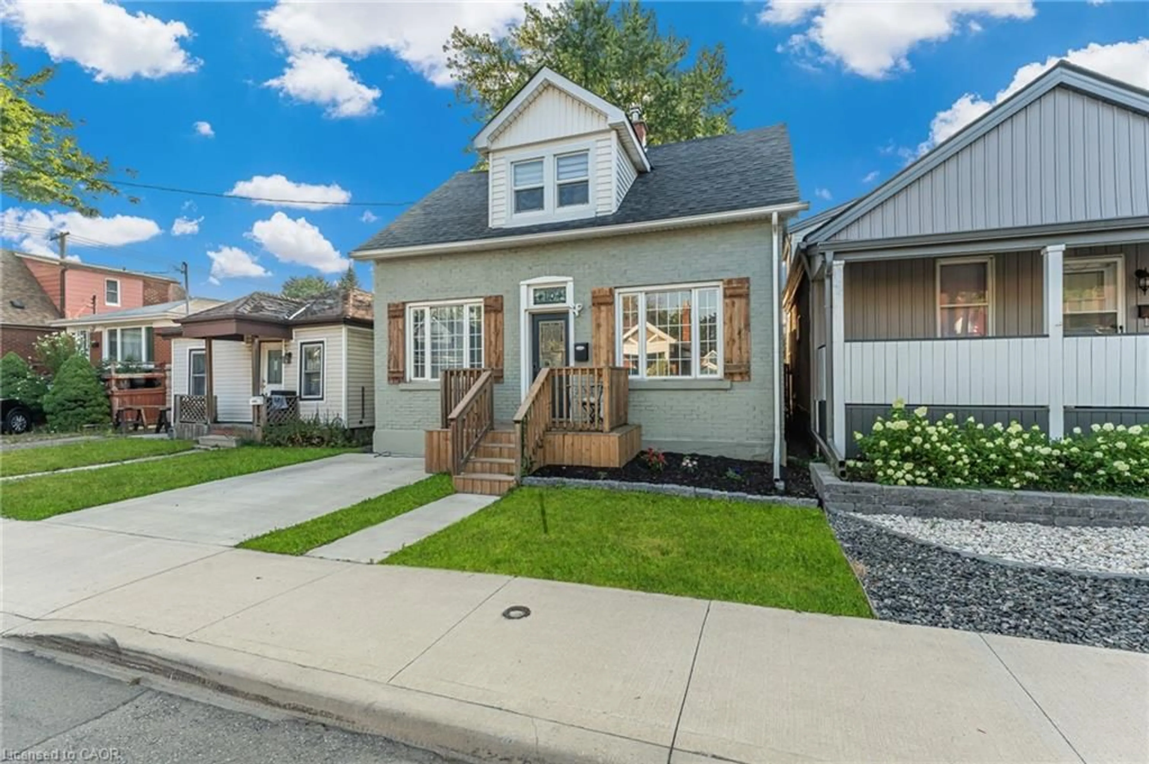 Home with vinyl exterior material, street for 110 Cameron Ave, Hamilton Ontario L8H 4Z2