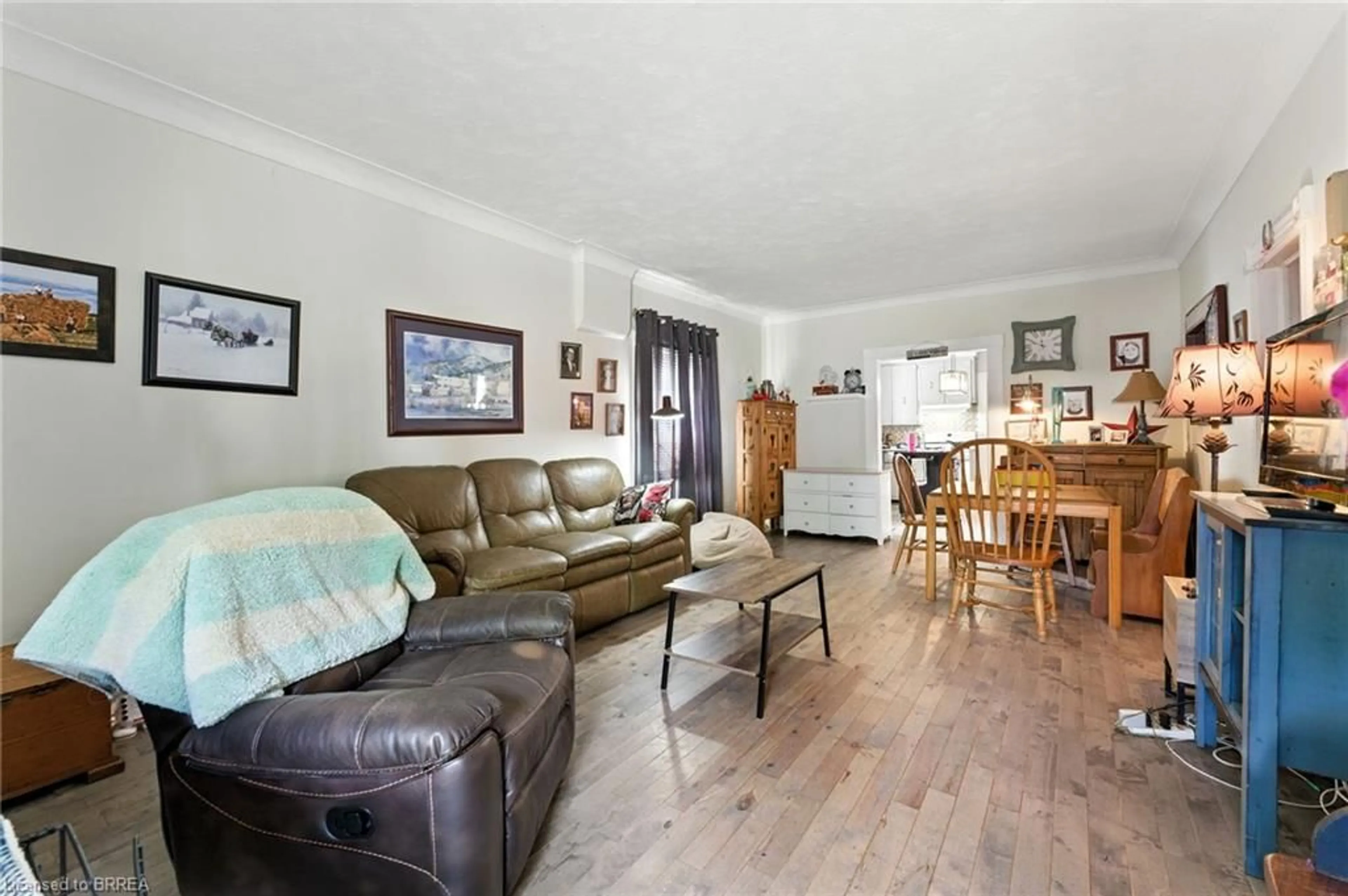 Living room with furniture, wood/laminate floor for 96 Aberdeen Ave, Brantford Ontario N3S 2S3