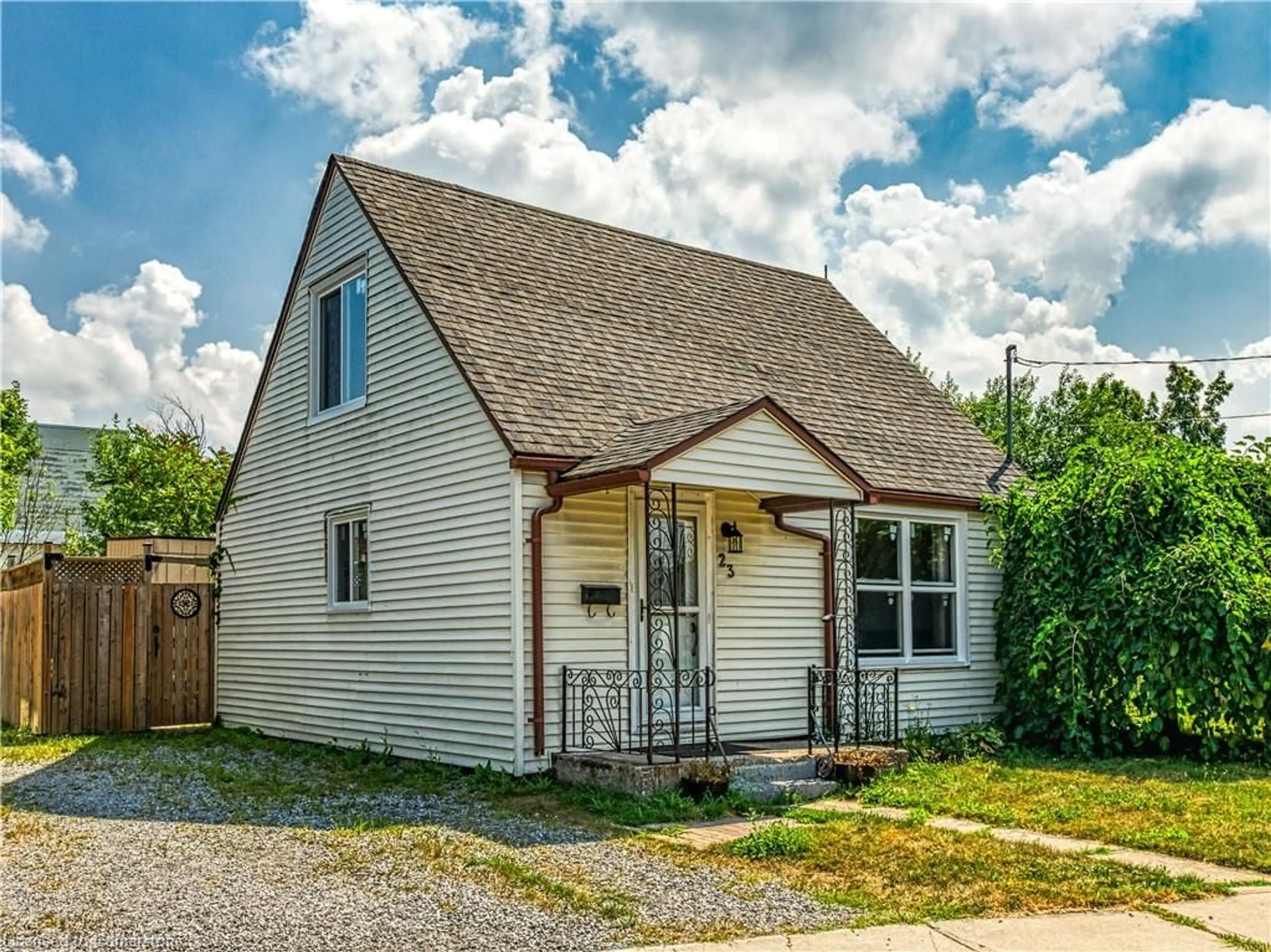 Home with vinyl exterior material, street for 23 Philip St, St. Catharines Ontario L2P 2M7