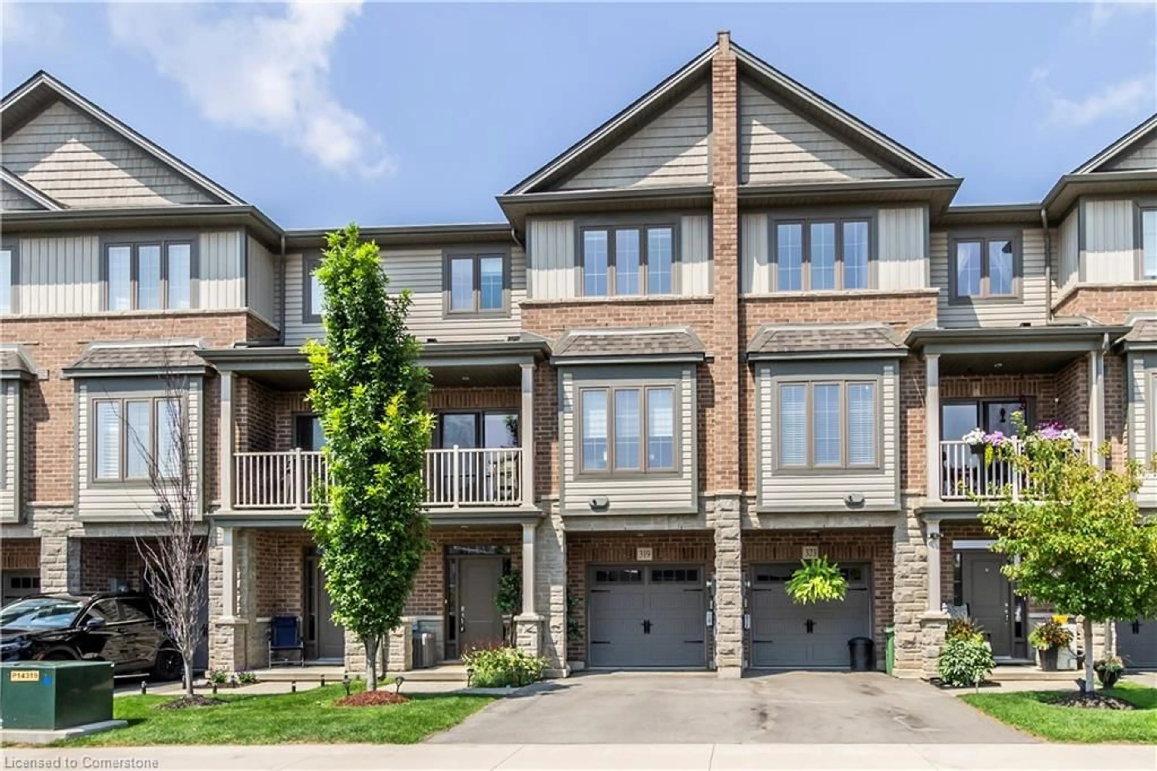 Home with brick exterior material, street for 319 Skinner Rd, Waterdown Ontario L8B 1W5