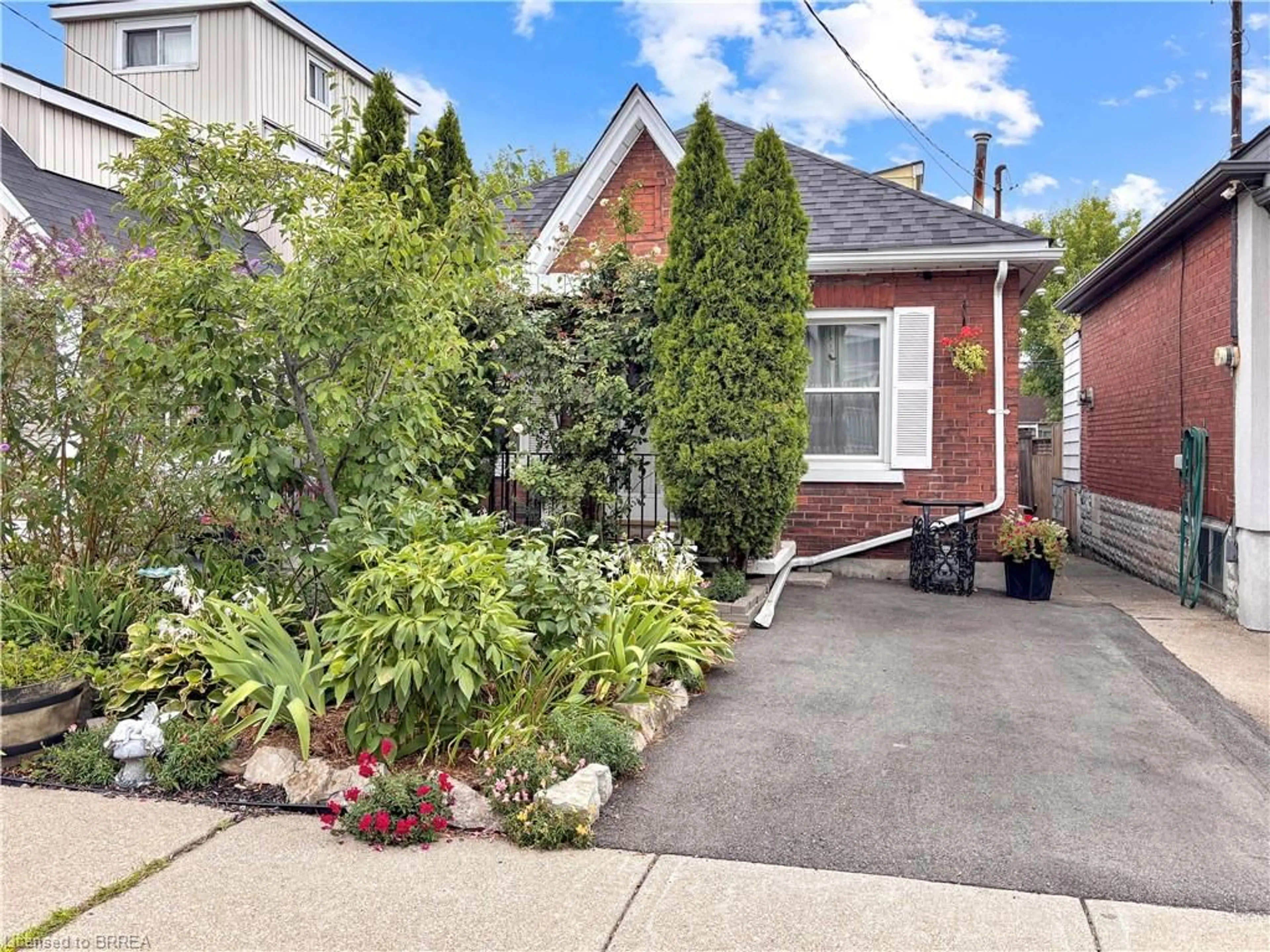 Home with brick exterior material, street for 71 Harrison Ave, Hamilton Ontario L8H 2Z9