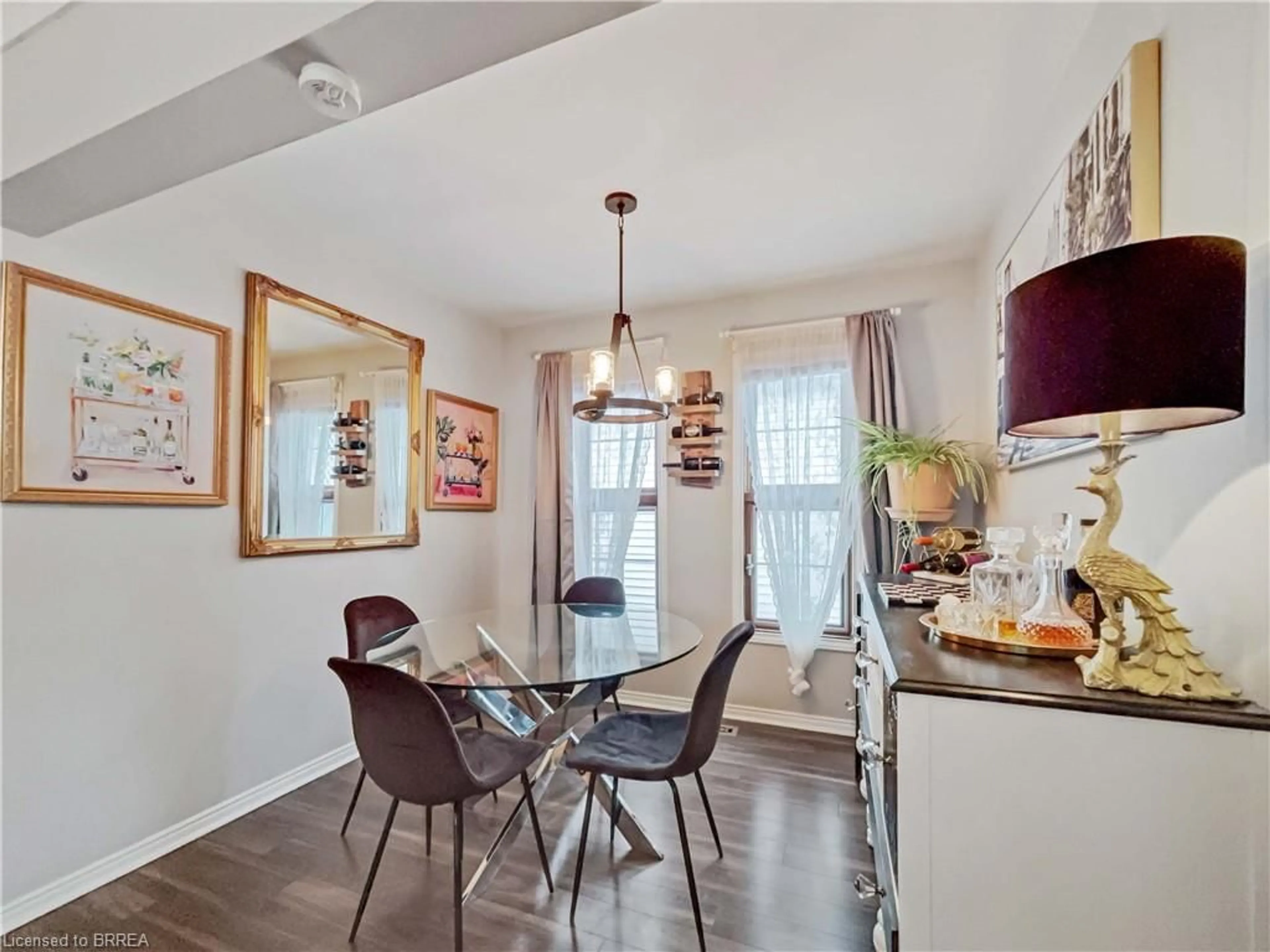 Dining room, wood/laminate floor for 71 Harrison Ave, Hamilton Ontario L8H 2Z9