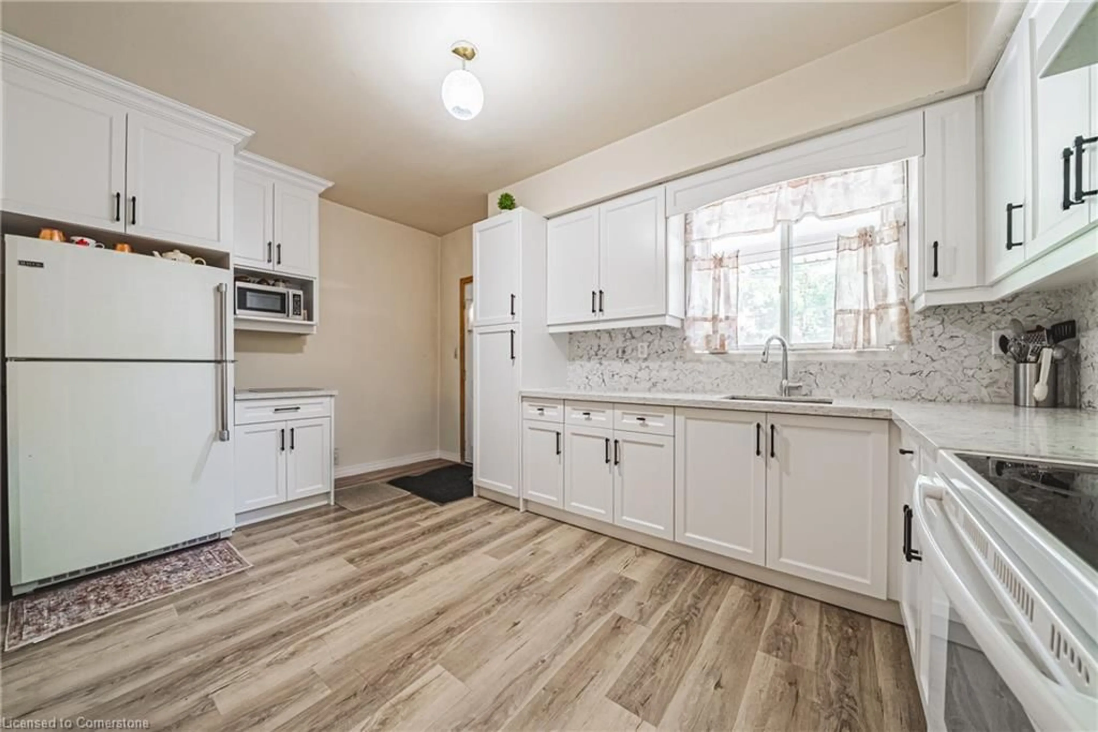 Open concept kitchen, unknown for 64 Kinrade Ave, Hamilton Ontario L8L 6L6